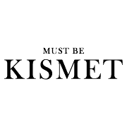 "Must Be Kismet" text in black serif font on white background.