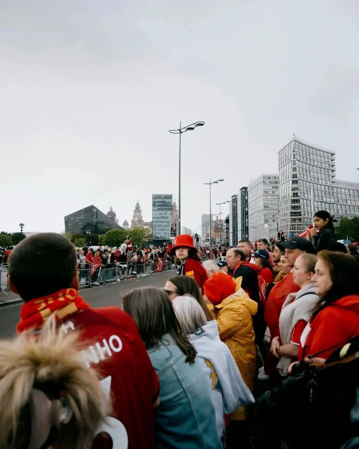 Soccer fans along road