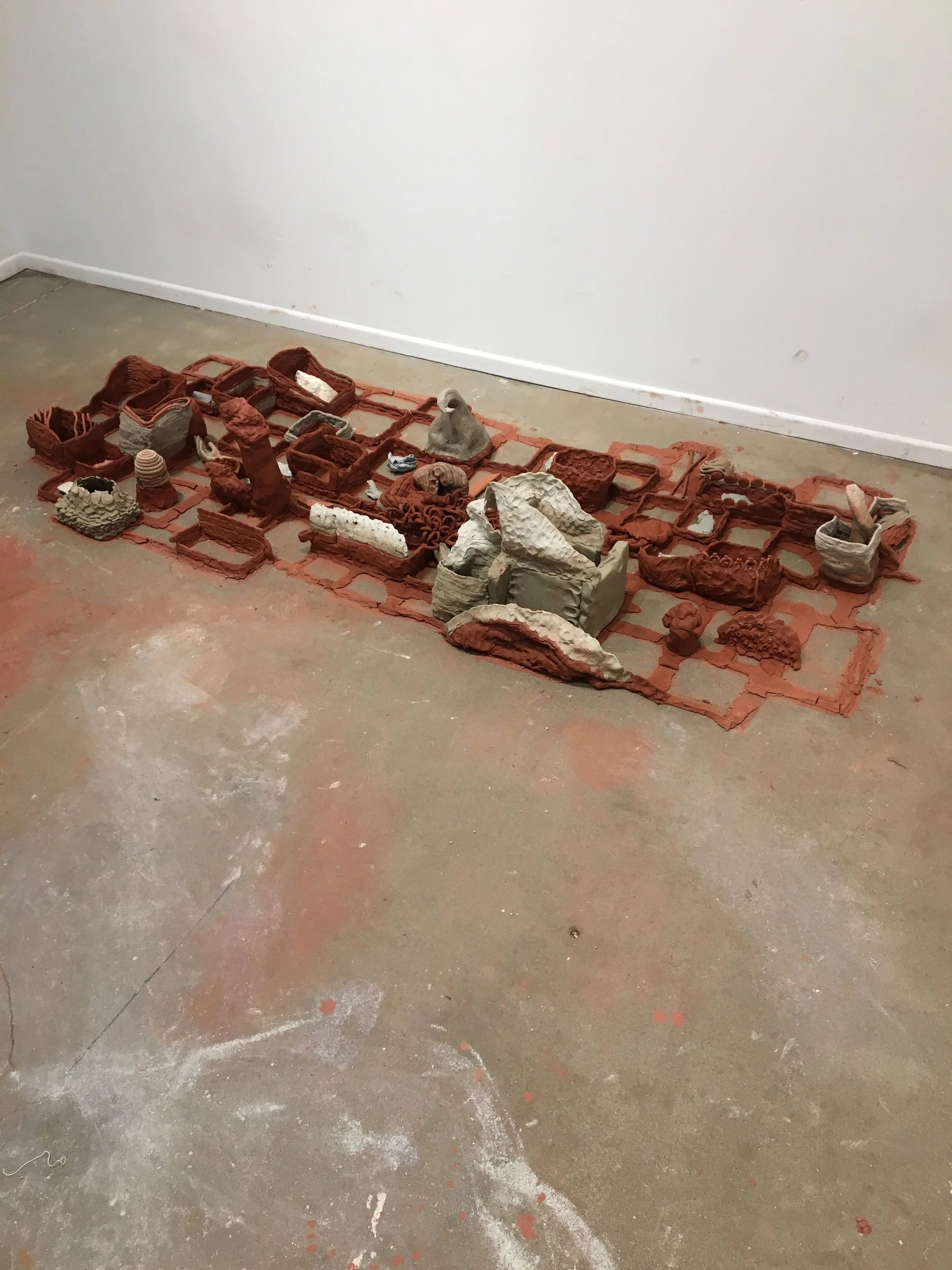 The result of two weeks fo continuous hand-building by three artists, ready to be reclaimed and subsumed into other projects. 