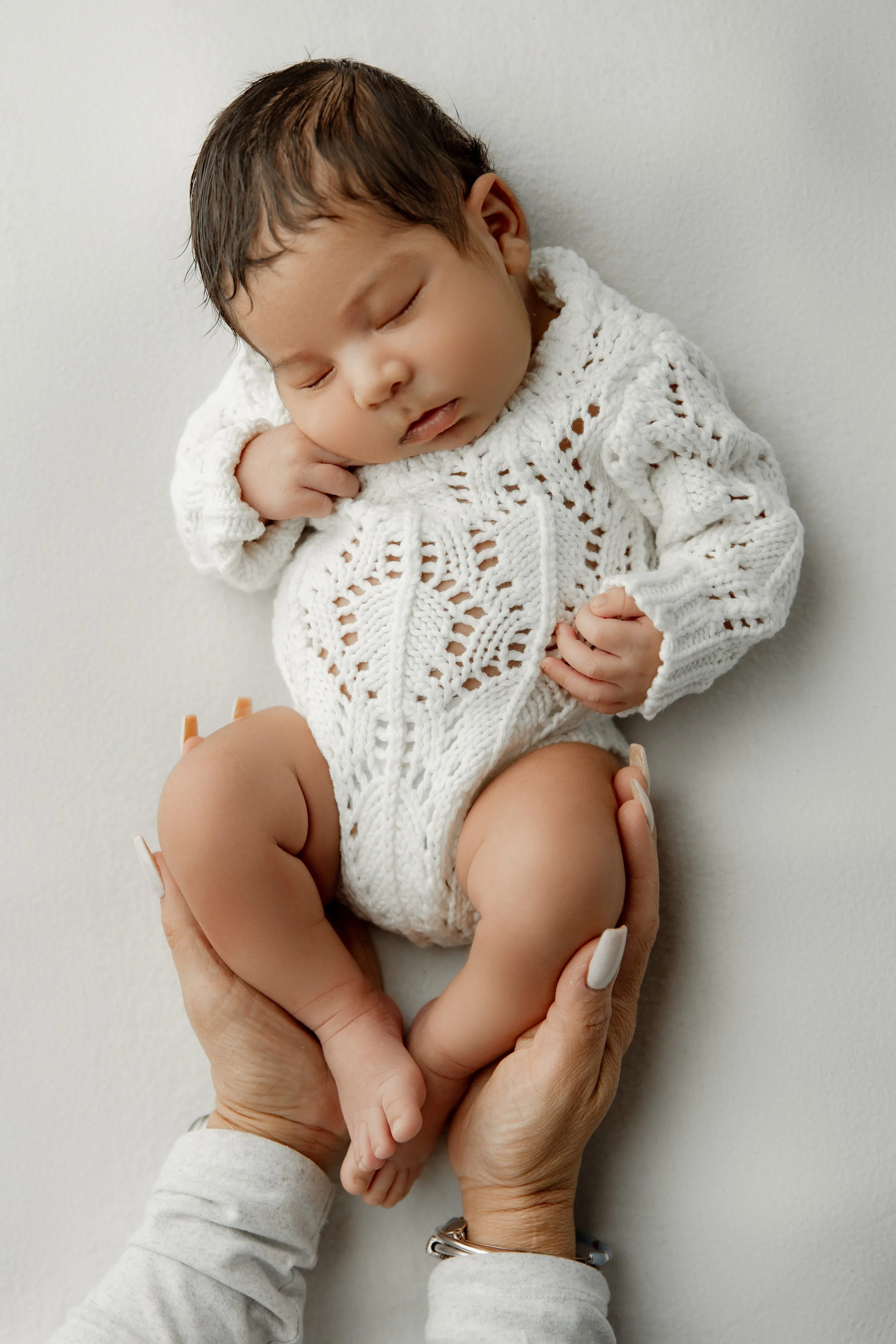 dallas newborn photographer with parents