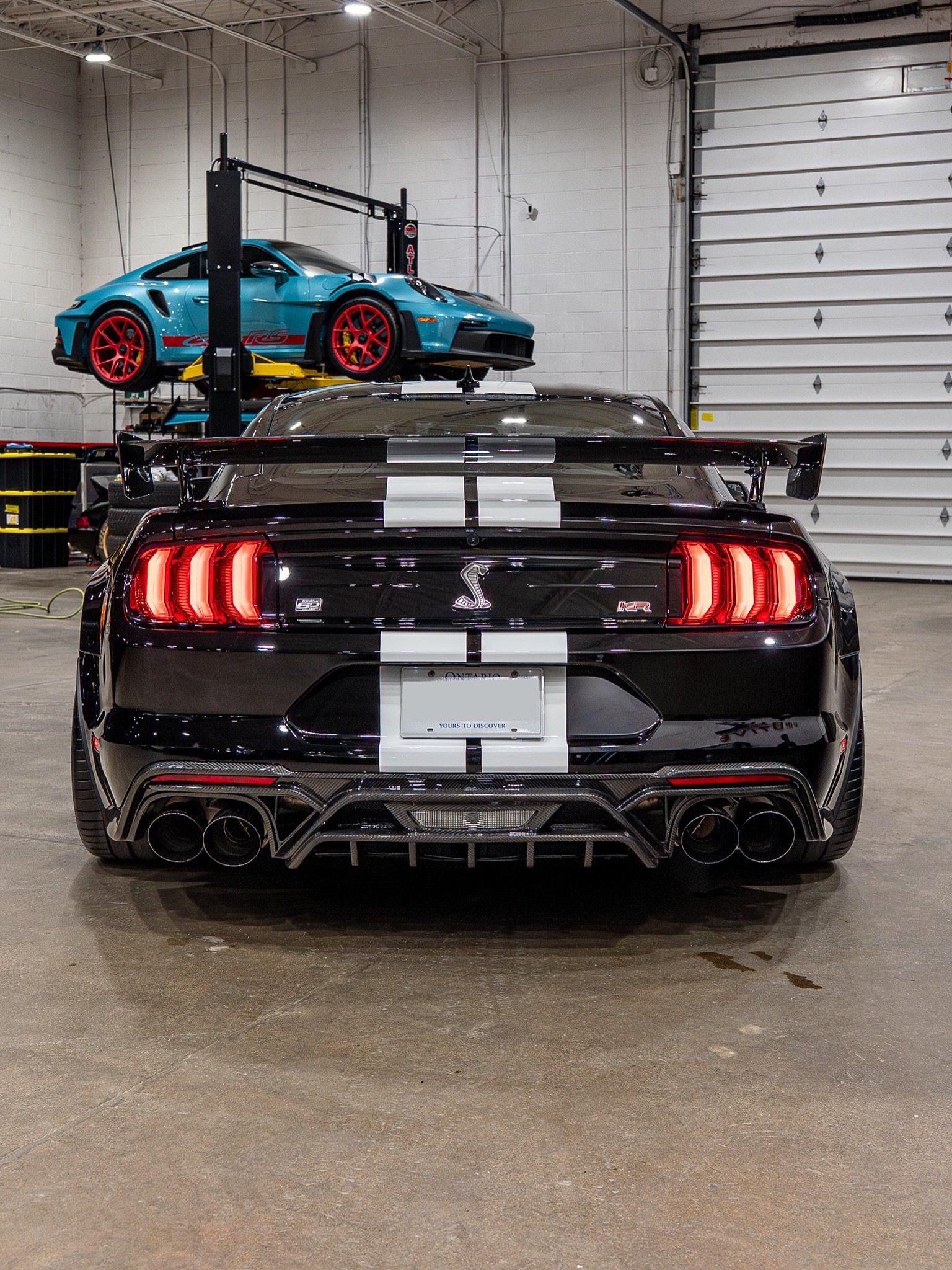 Are you taking the new Dark Horse SC over this? 🔥 The Shelby GT500 will always be special to us, and especially the KR, or King of the Road 🐍 This beautiful example was just revitalized with a top to bottom paint correction and ceramic coating to b