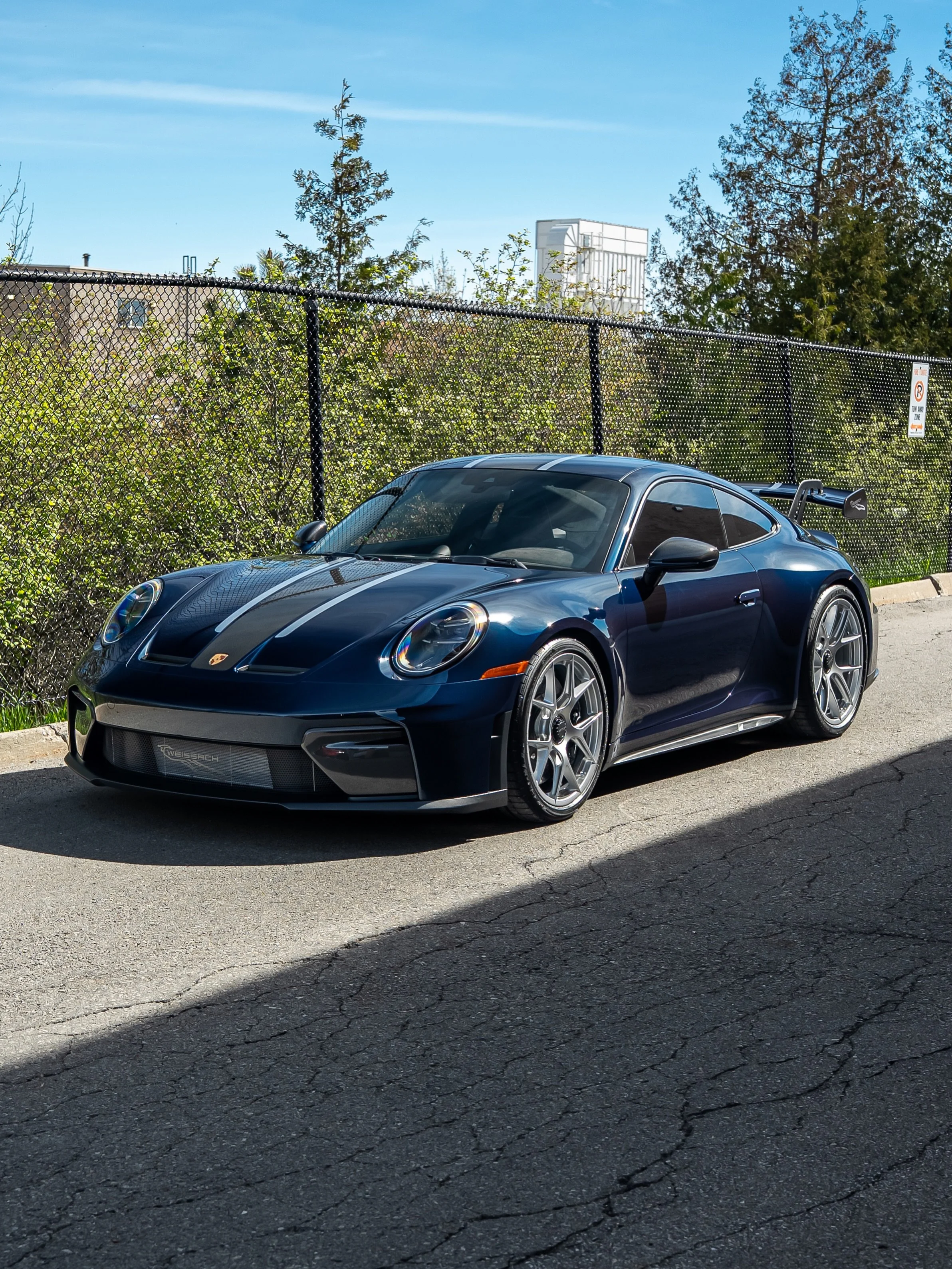 Can&rsquo;t get enough of these 992.2 Weissach GT3&rsquo;s 🔥 Especially when specced in this incredible paint option and exposed carbon fiber strip from the wing down to the hood. This stunner received a custom paint protection film install from top
