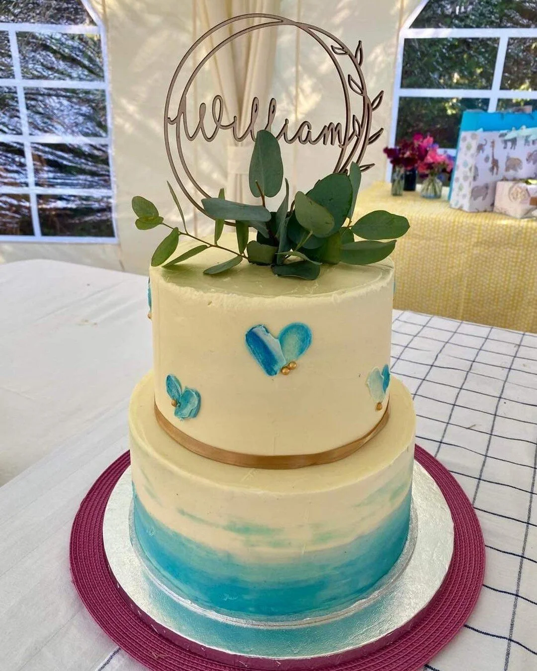 A lovely christening cake, Vanilla and chocolate sponge tiers covered in buttercream. 
Graduated colour and free hand hearts to decorate. 

#chrsiteningcake #buttercream #cakedecorating