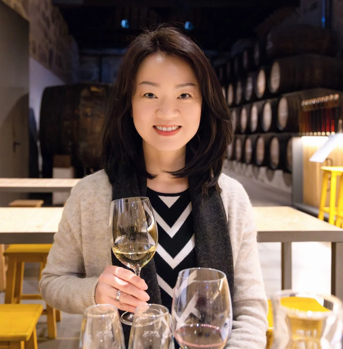 A beautiful woman with a glass of wine
