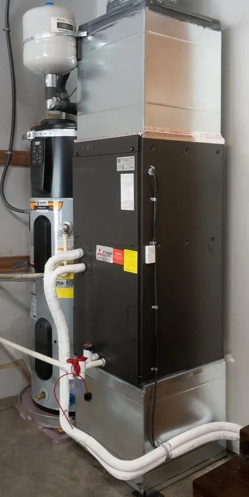 A heat pump air handler and heat pump water heater