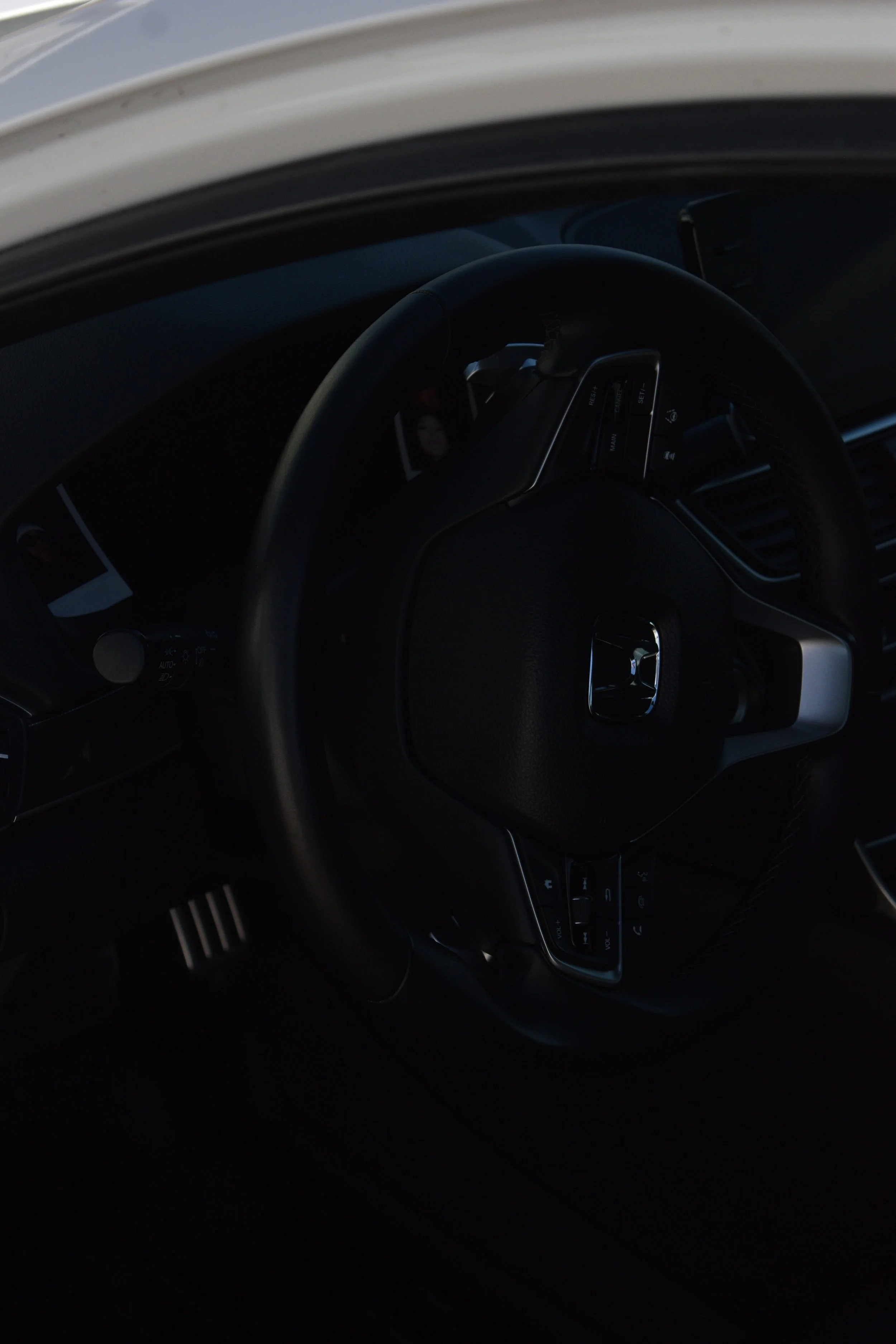 Interior Complete Detail Steering Wheel in Eagle Mountain, UT. meticulously dusting all cracks and crevices with an air blaster and soft horse hair brush. Followed with a thorough cleaning with our shine supply solution diluted 4:1 for a perfect brea