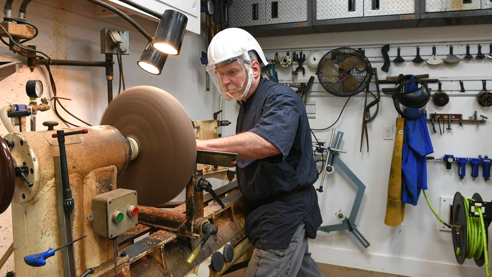 Fine art woodworker Steve Miller turning wood in his Asheville/Black Mountain studio.