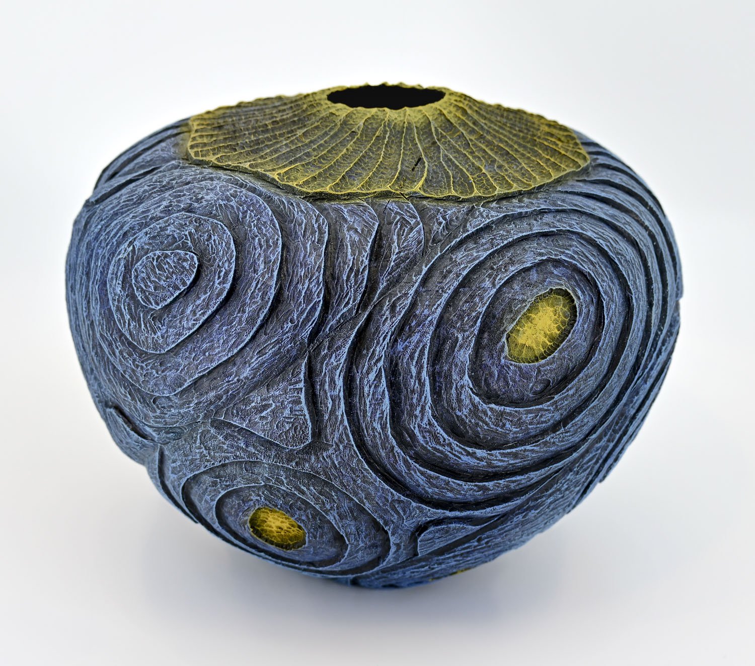 Bright blue and lemon colored TOPO MAP ~ Oak Vase  Turned wood, carved, painted with India ink and acrylics. Dimensions: 5"h x 10"w
