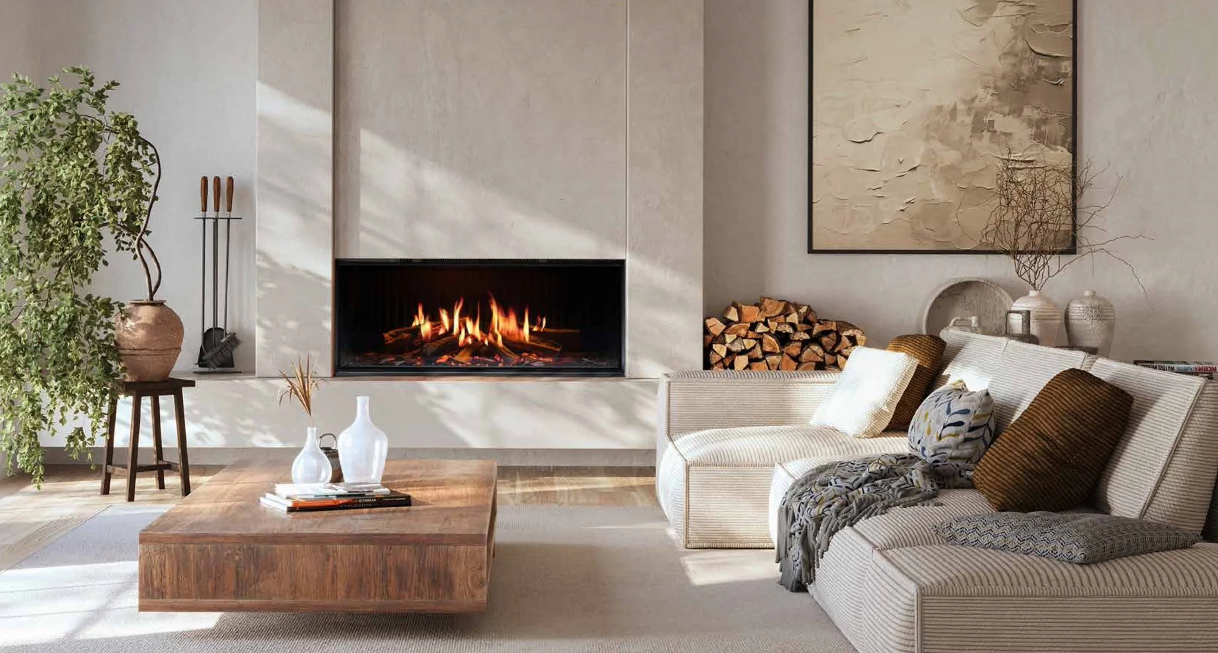 Living room with a modern fireplace, beige sofa with pillows, a wooden coffee table with vases, a large abstract painting, a stack of firewood, plants, and decorative objects.