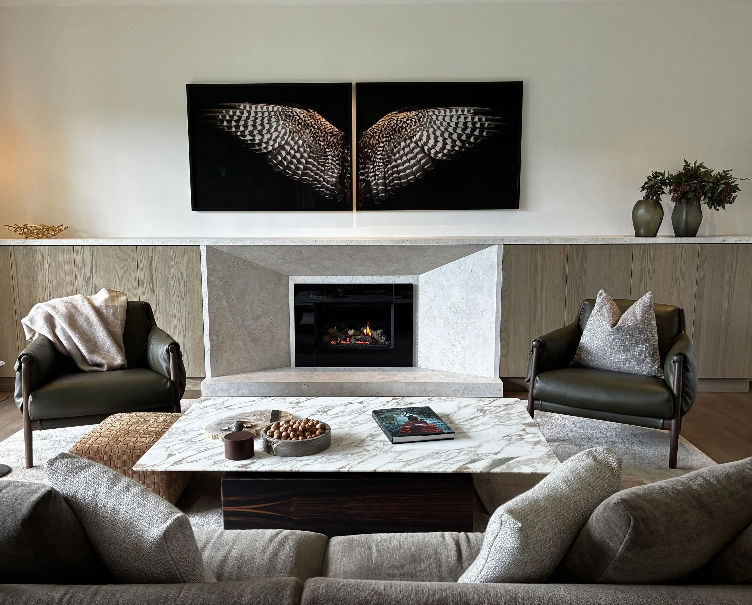 Gas fireplace in living room with stone surround 