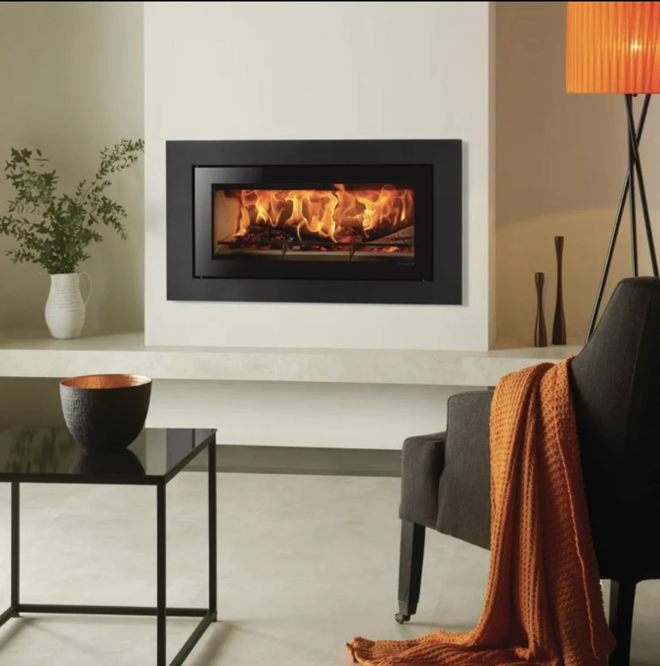 Stovax Studio 2 wood fire burning logs  with orange flames and burning wood.