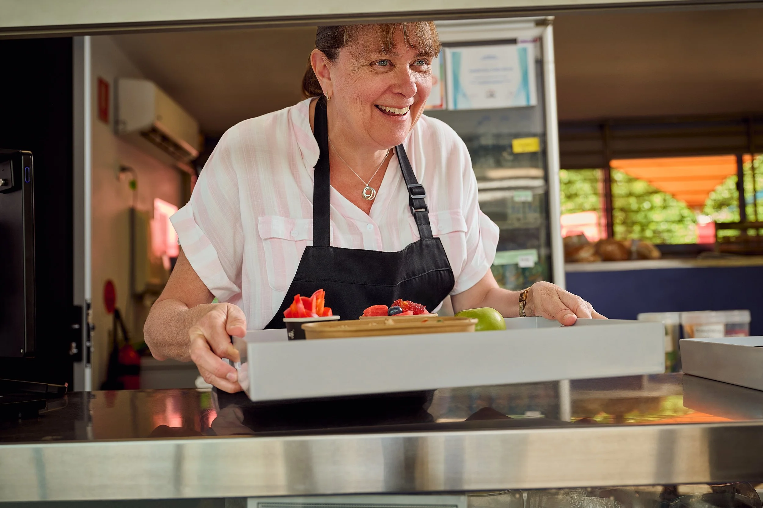 Canteen operator preparing for service