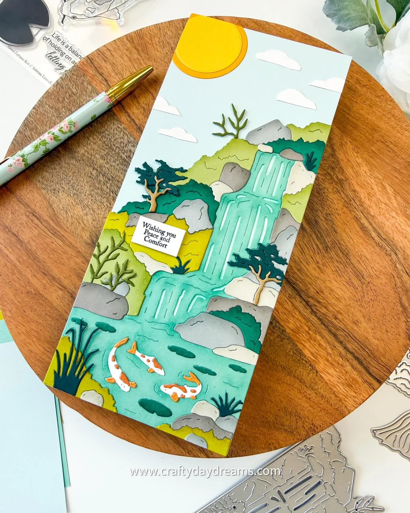 Happy Tuesday, friends!! I have the absolute pleasure to guest for @scrappytailscrafts with their gorgeous new Good Fortune release! I really enjoyed creating with the Waterfall Koi Pond trifold die &amp; the side-wings trifold add-on set!

Instead o