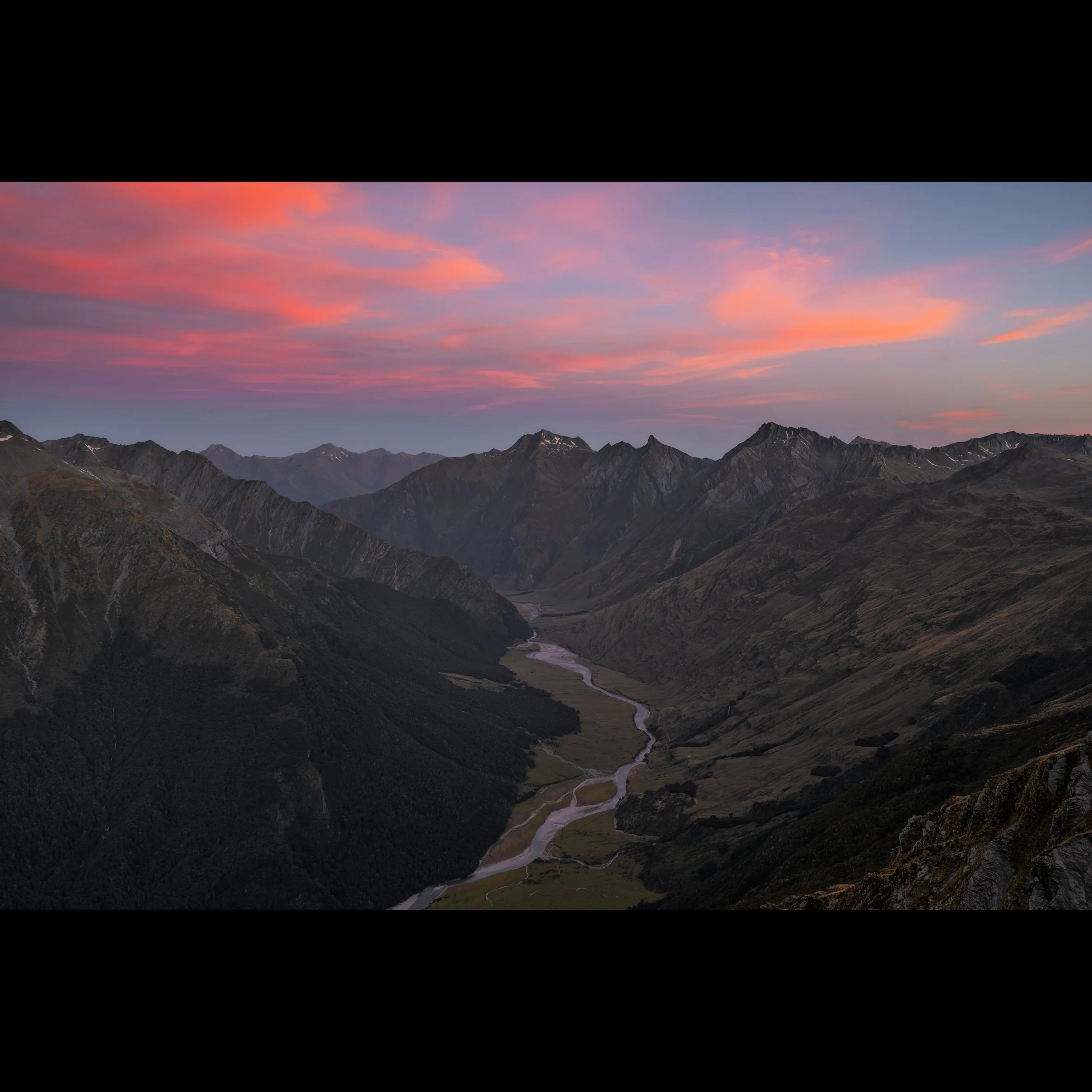 Sunset from Cascade saddle Looking down the Matuktuki Valley in Mt. Aspiring National Park.