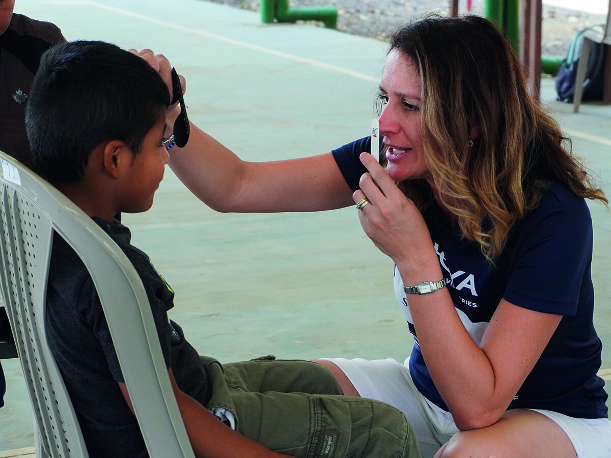 Eye Doctor Optician Examining Child Guatemala