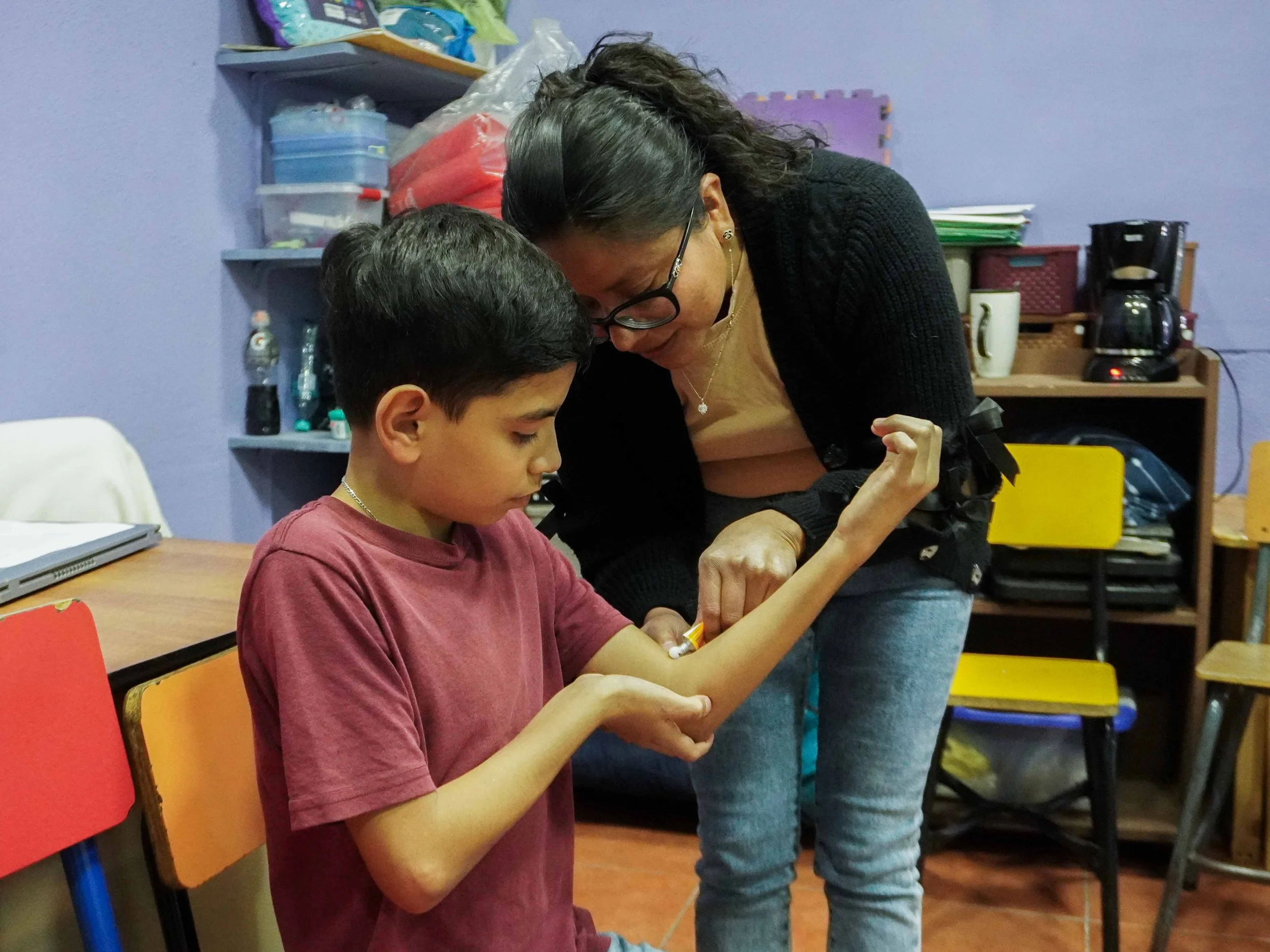 Measuring The Height Of A Student Child At The School of Hope In Guatemala