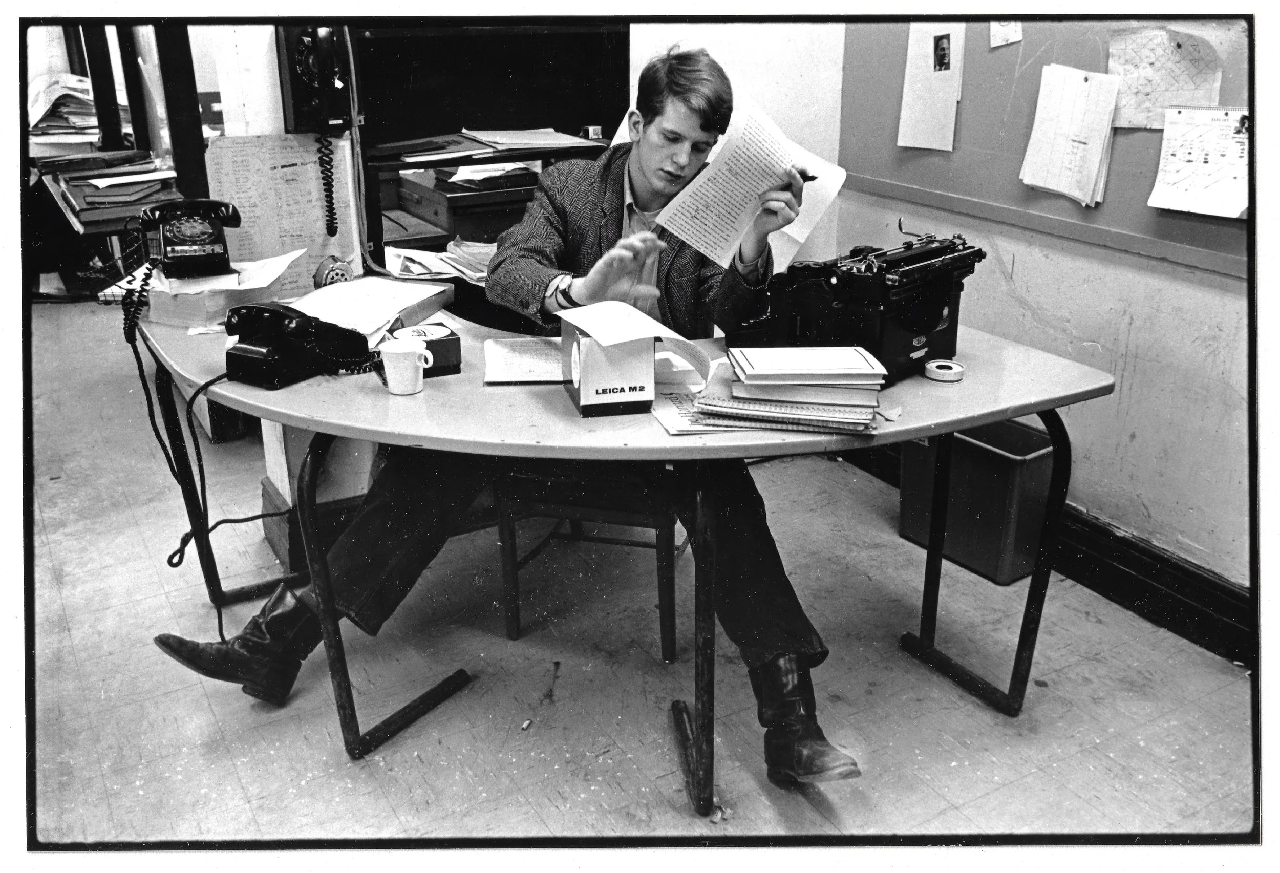 Photo Editor Charles "Chuck" Hagen works on a story in the Harvard Crimson newsroom