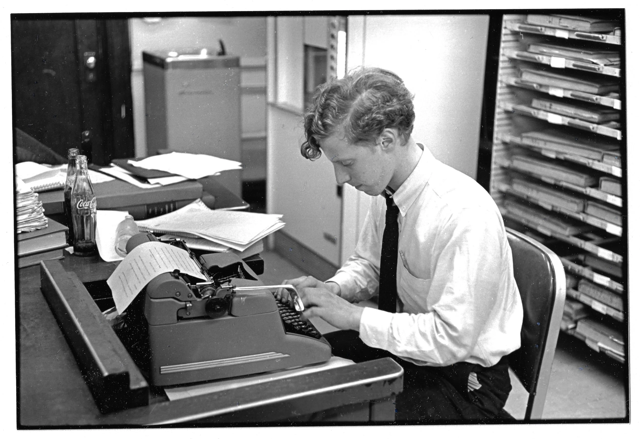 A Harvard Crimson writer with a curl at work.