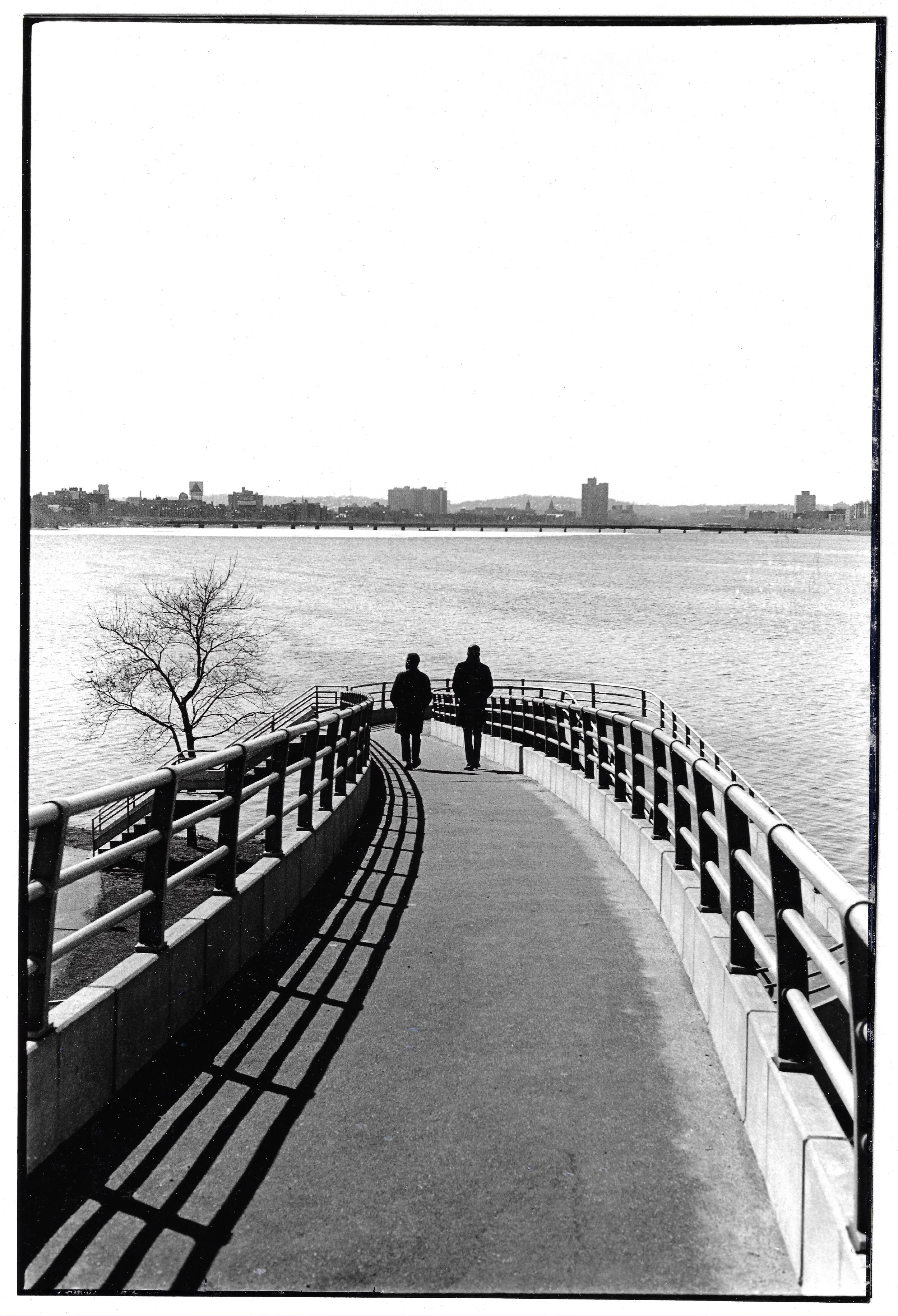 A male couple going down to the Charles