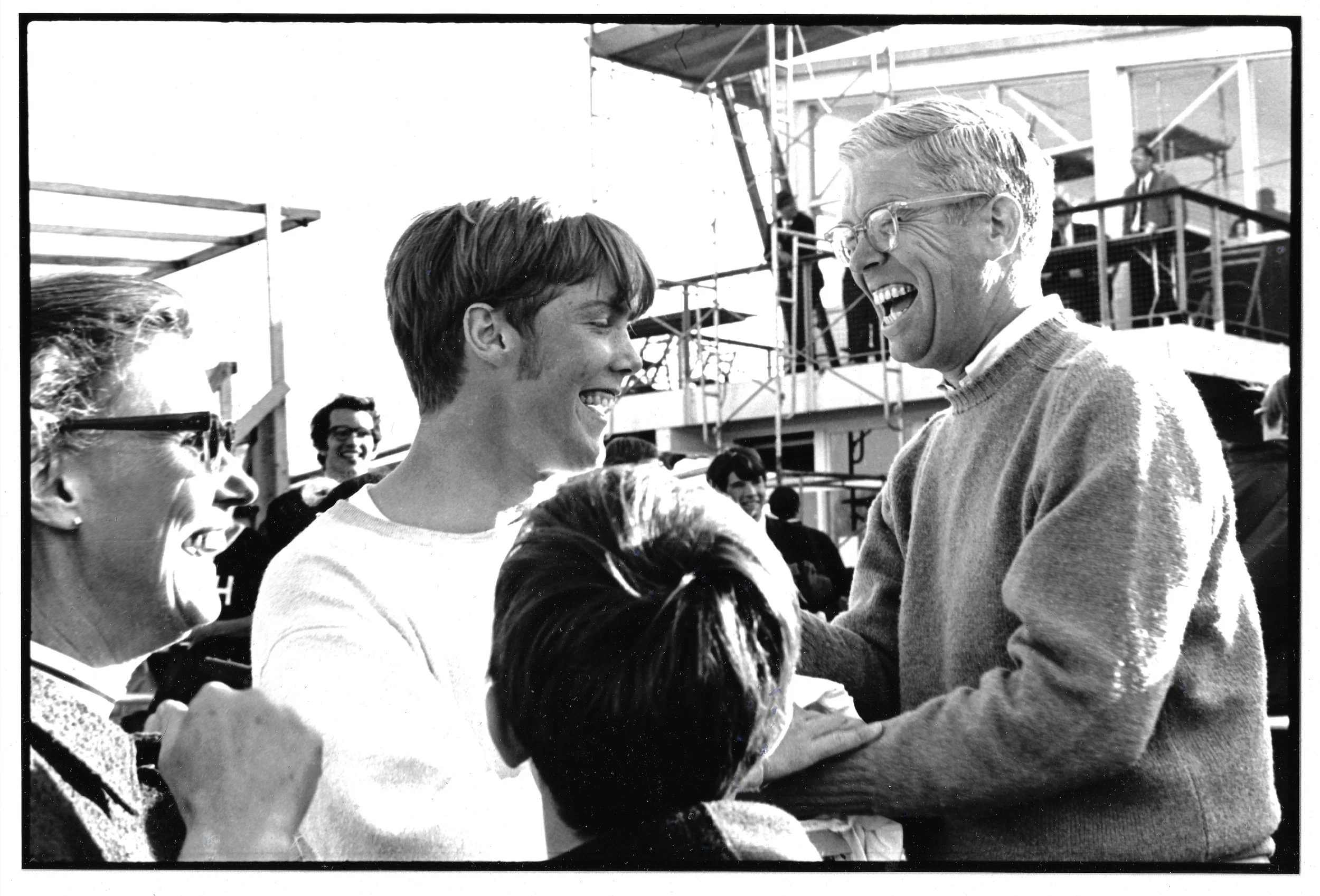 Harvard crewman celebrates with family.jpeg