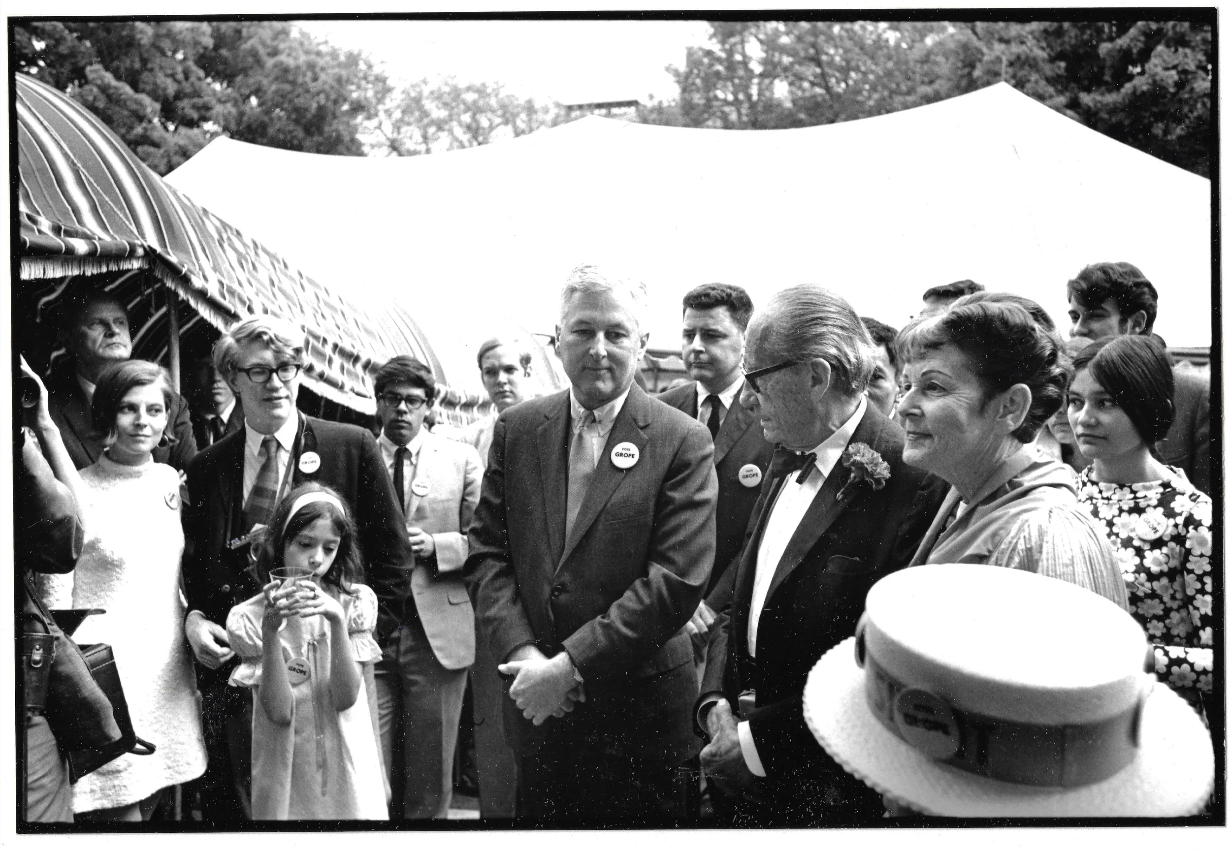 Harvard President Bathan L. Pusey at Center next to honoree Wakter Gropius and his wife Ise at a reception for him at the School of Architecture, months before his death in 1969.