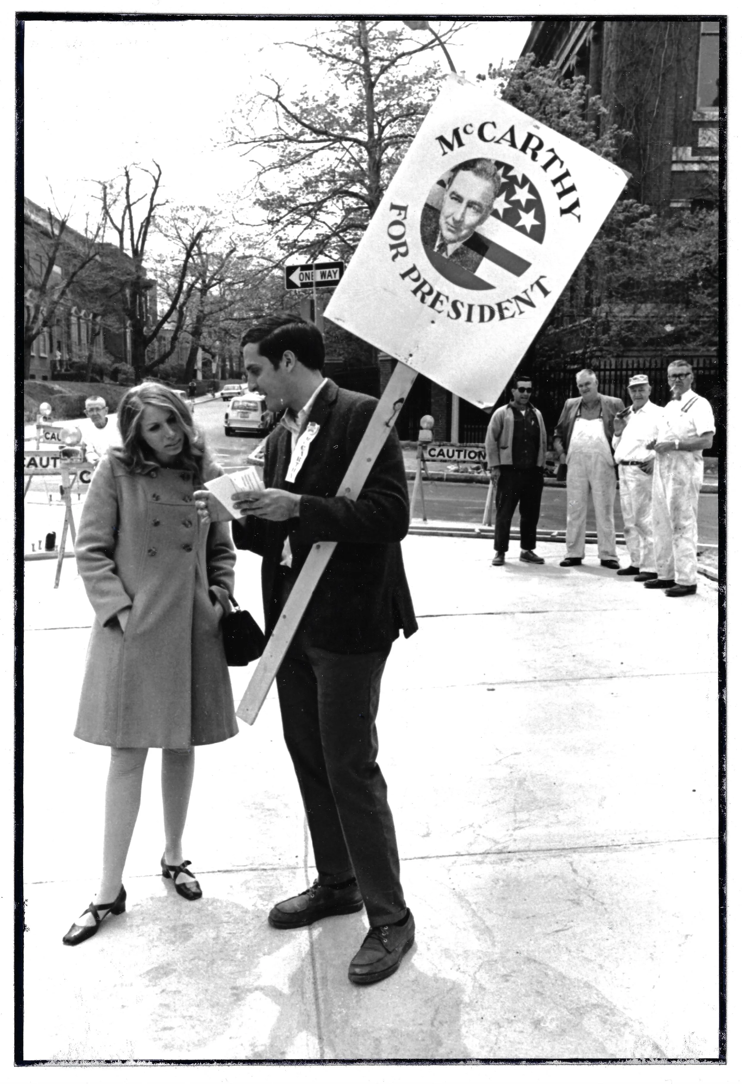 Eugene McCarthy supporter in action with real-world people in the background