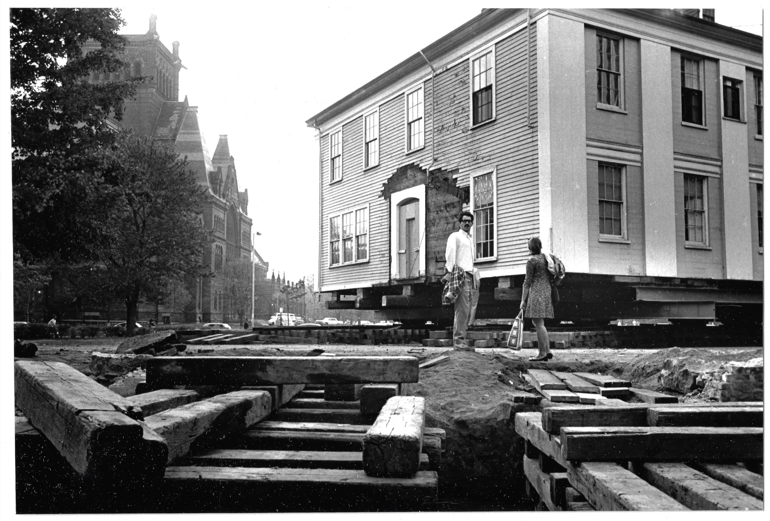 House moving of a building from behind Memorial Hall. 