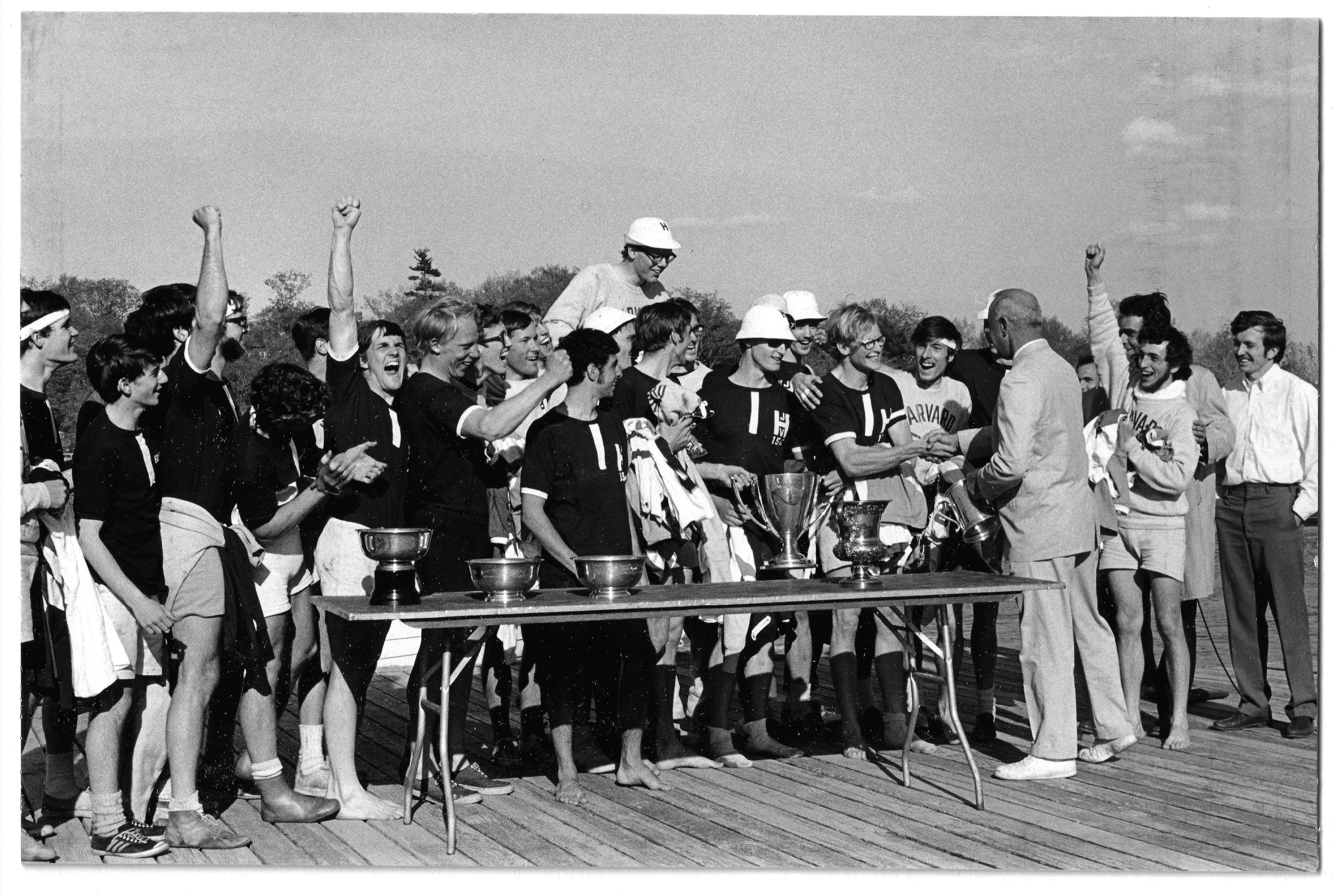 HArvard crew celebrate with trophies low res.jpeg