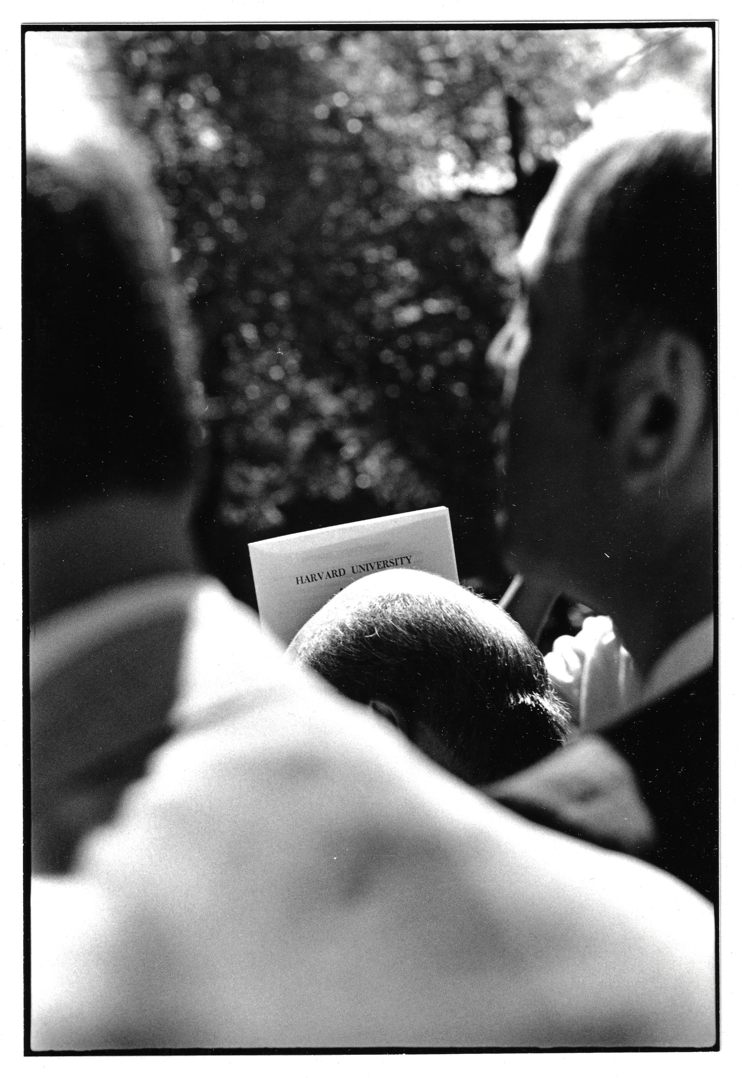 Egghead holding his program at commencement