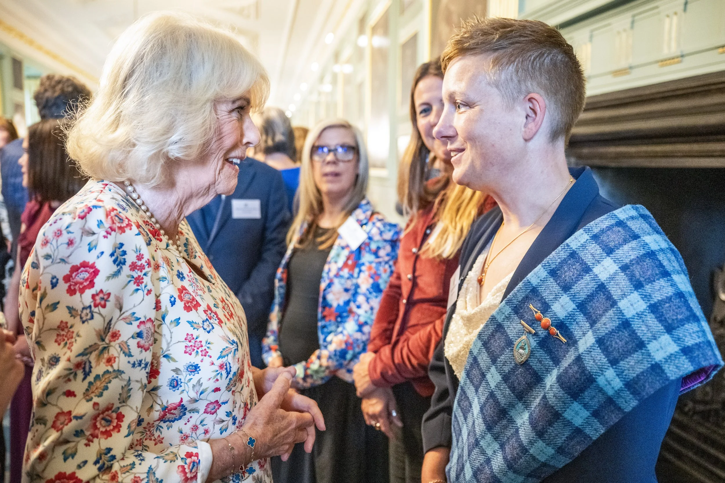 Her Majesty The Queen hosts a reception for QNIS