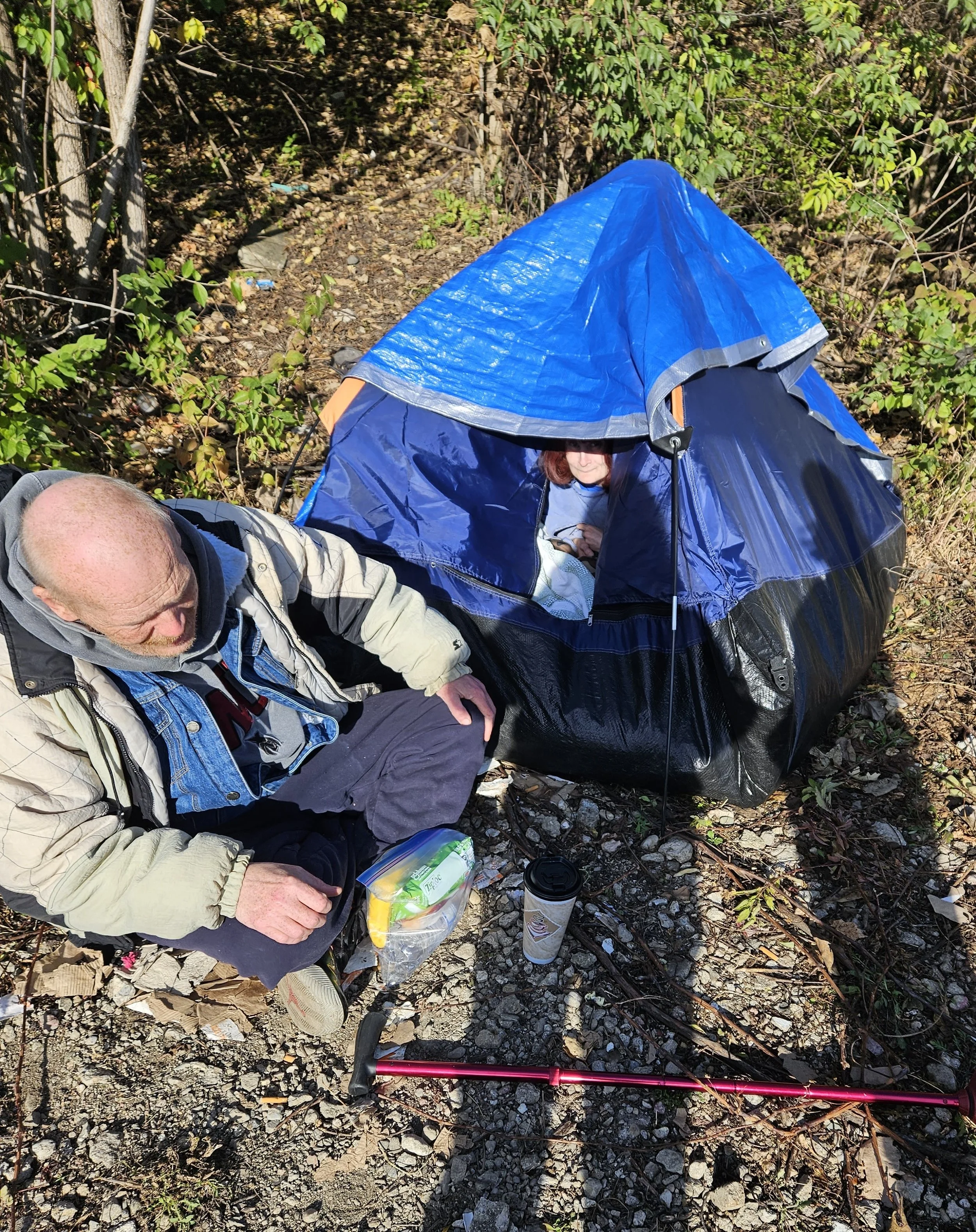A chronically homeless couple living in a tent in November 2023.