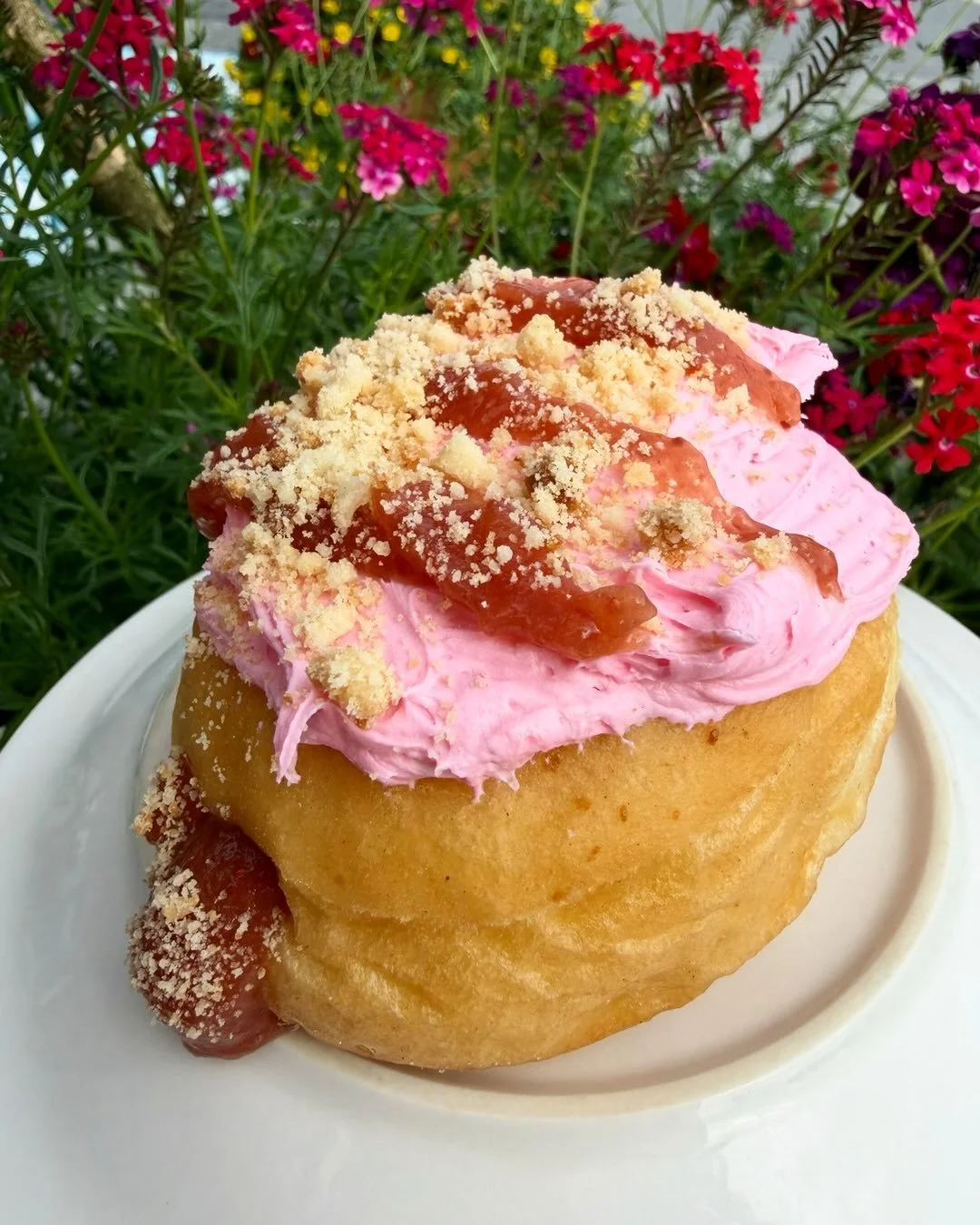 The donut of the summer is back! Come in and try the delicious strawberry rhubarb donut.