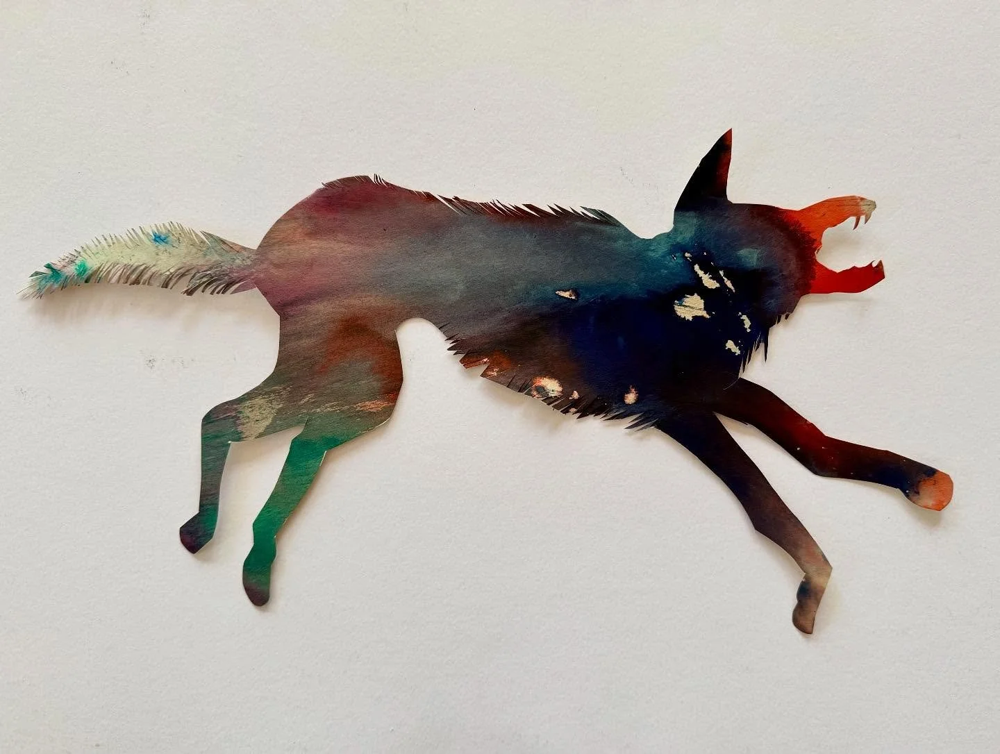 Day 34 of 100: Wolf Thing. 
I used liquid watercolor on paper over the weekend, just to see what I could make out of it and what I could cut out of it. So far it doesn&rsquo;t look so great. But I&rsquo;m trying out lots of things. I also don&rsquo;t