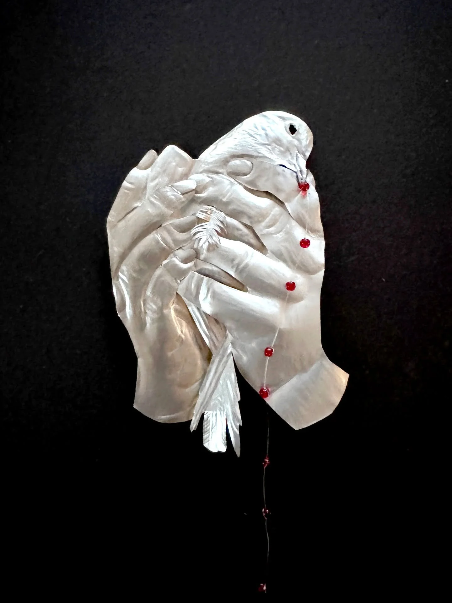 Day 79 of 100: Dove Bite

You know how at some weddings the wedded couple grasp doves in their hands, pinning their wings down, and then toss them up in the air to flap away? I suppose to fly to their owners/handlers to get caught, petted into calmin