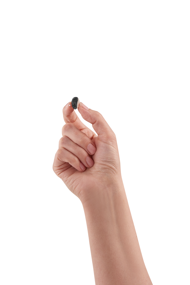 Hearing device in someone's hand
