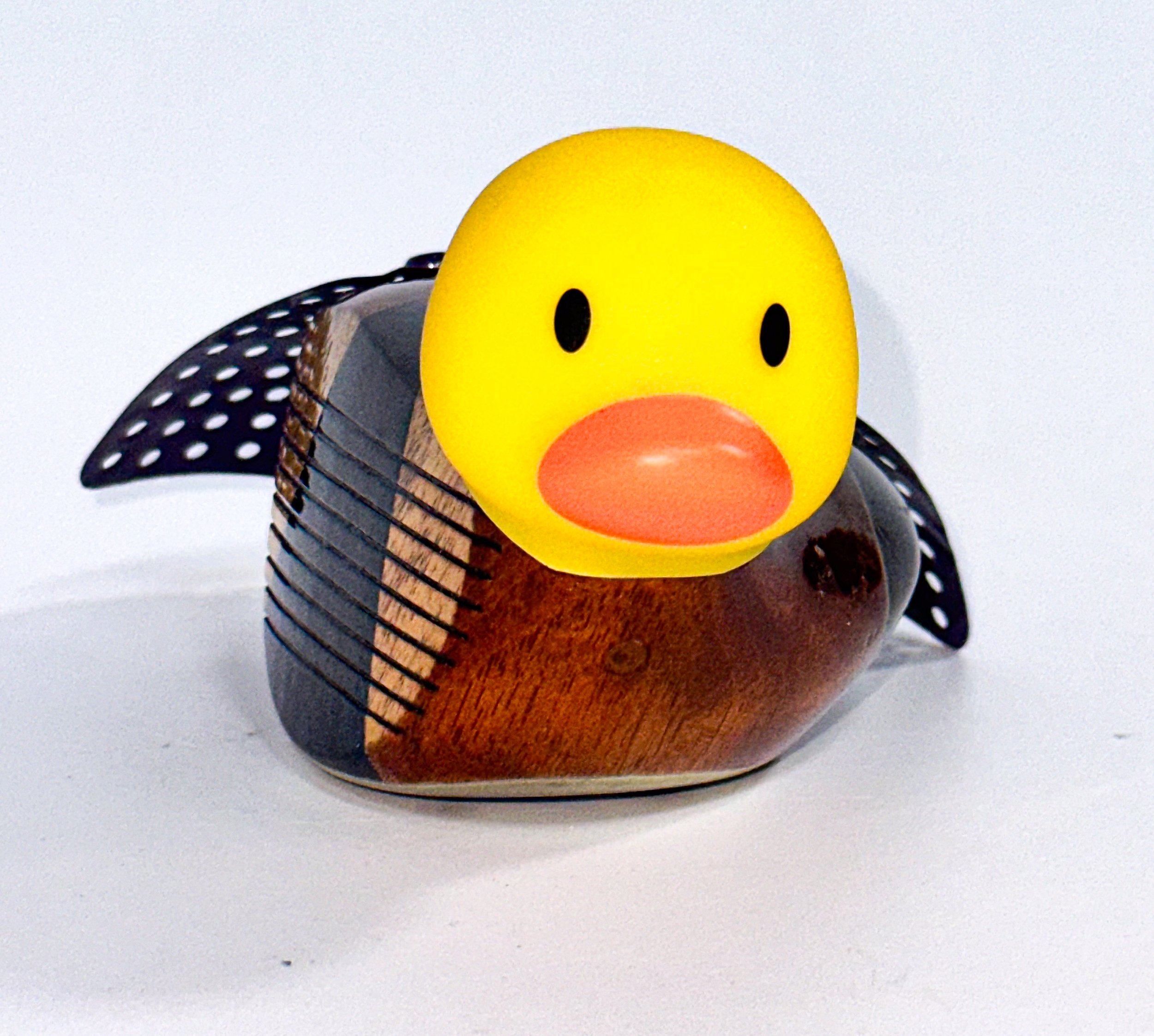 SOLD;
Woody (or wouldn't he?)
Vintage wooden driver, rubber ducky head, vegetable steamer leaves.
Woody is a juvenile, rare, Purple Long-Tailed Duck, a native of the High Arctic. Typically the Long-Tailed Ducks are migratory, and breed in the high