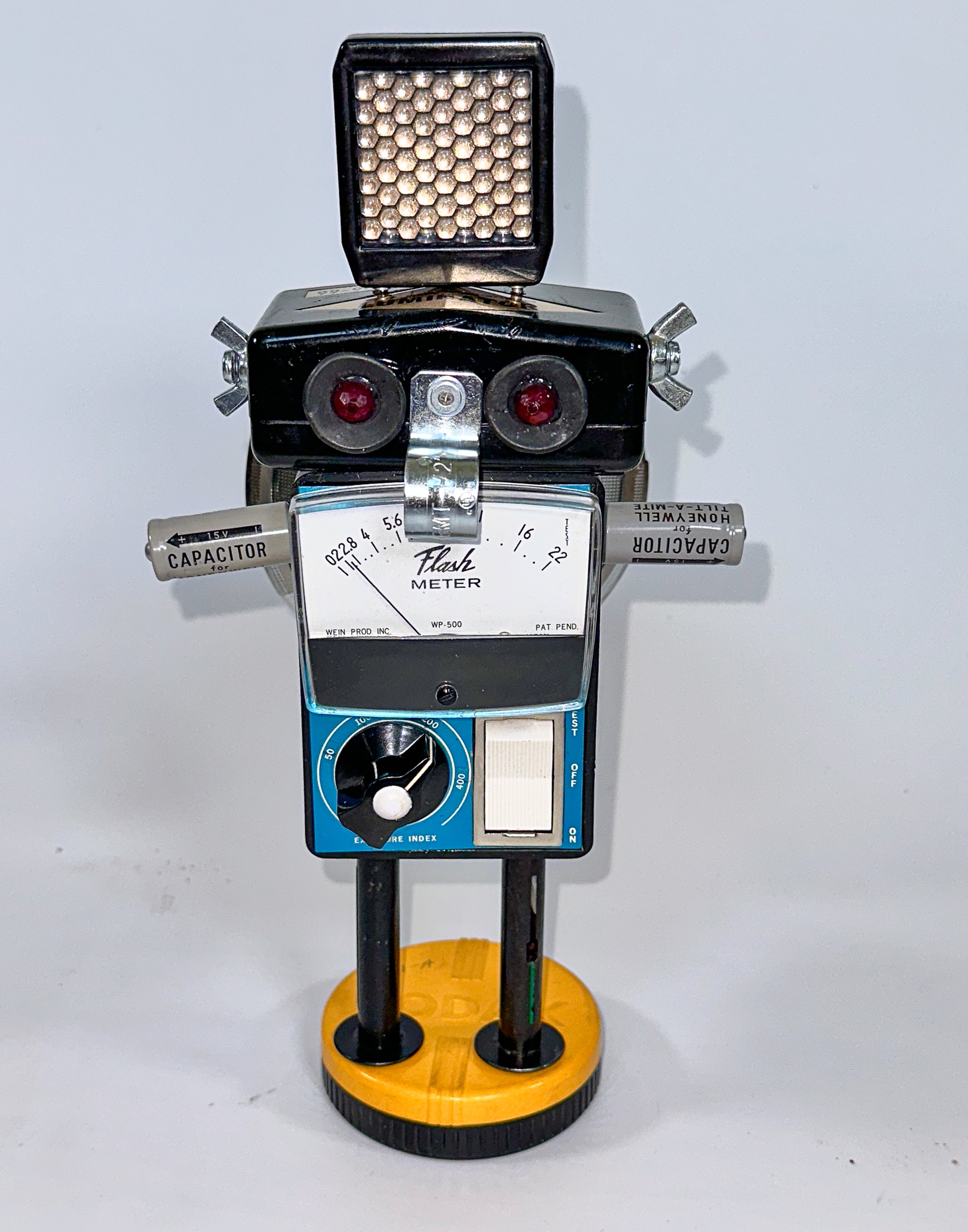 SOLD. Photobot #7; "Meter Man". To be exhibited at the Featherstone Gallery of the Arts Holiday Gift Show, Nov 13 - Dec 17.
12" X 6" X 4"