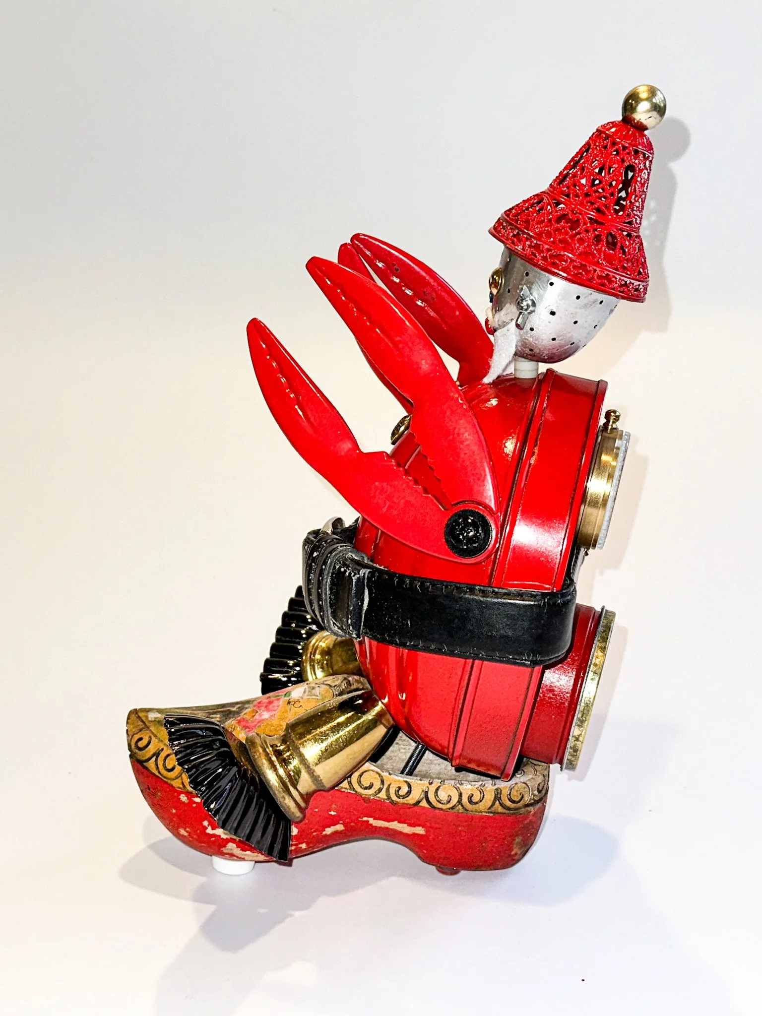 SOLD. Santa Claws, side view.