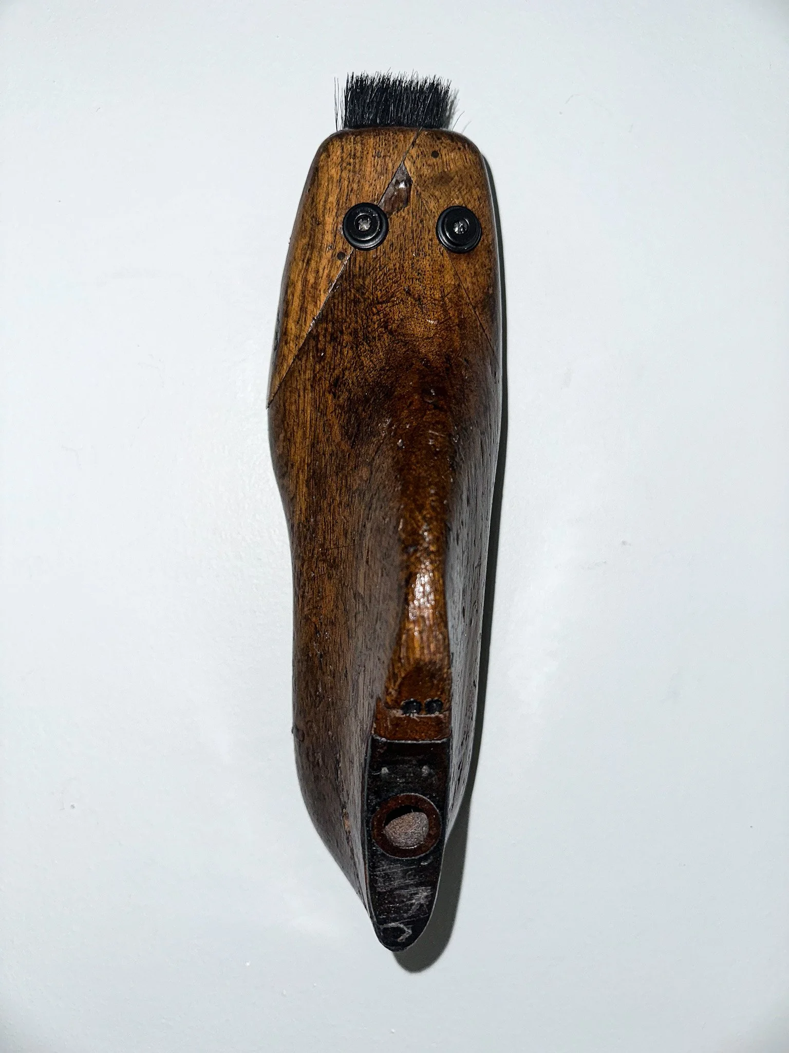 AVAILABLE: "Mickey the Black-Crested Macaque Monkee" 10 X 3 X 4
Constructed from: Antique wood and metal shoe last, snap screws, paint brush.
