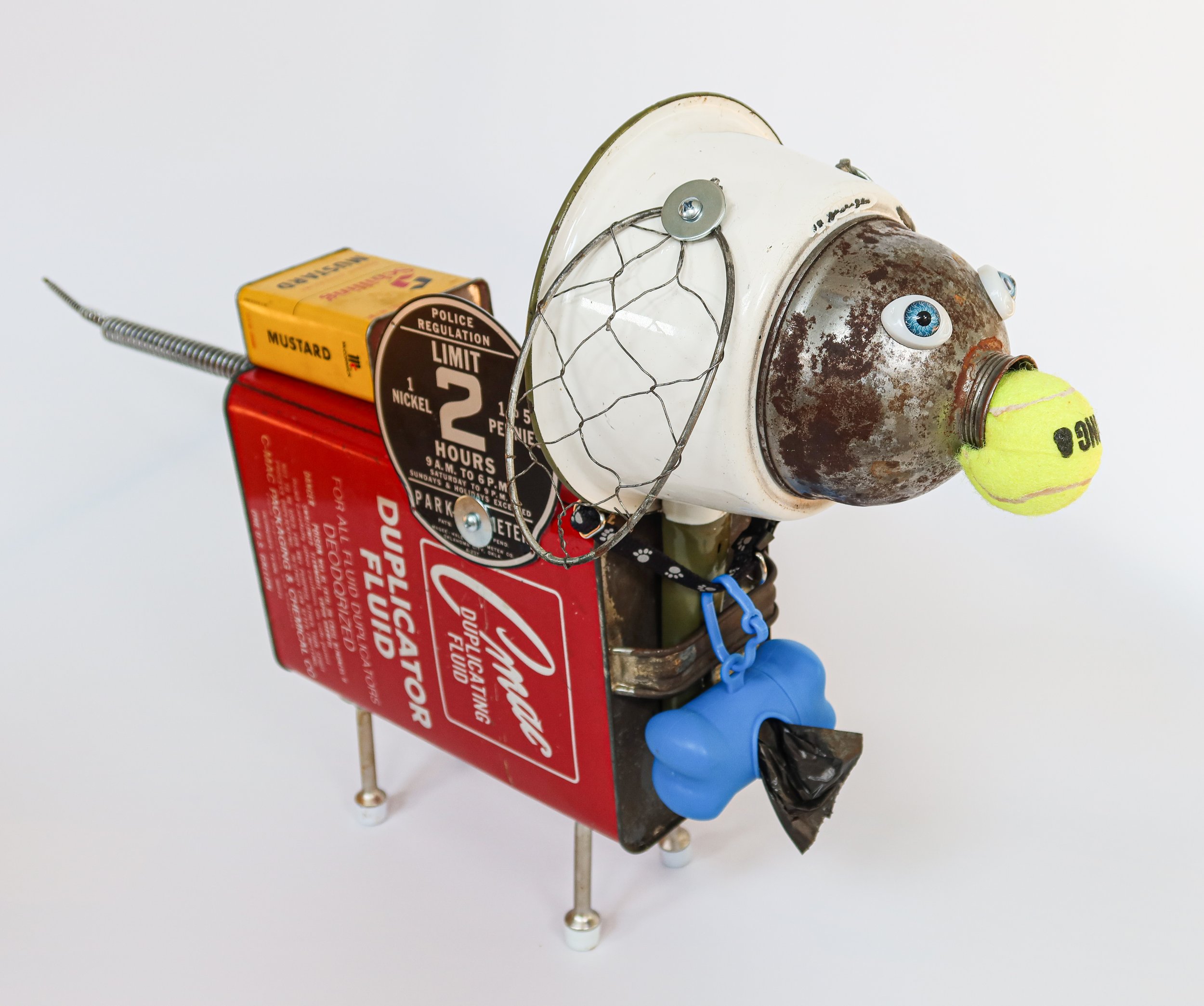 SOLD. Found Dog #2; Dollie.
25" X 15" X 7"
Dollie is a smooth-haired, red Dachshund, originally from Germany. She was named after her parents’ favorite artist, surrealist Salvador Dali, however when she emigrated to the United States at age 14 (2