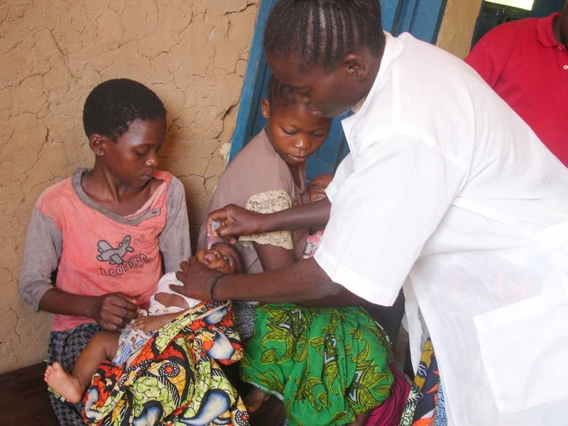 Infant receiving healthcare.JPG