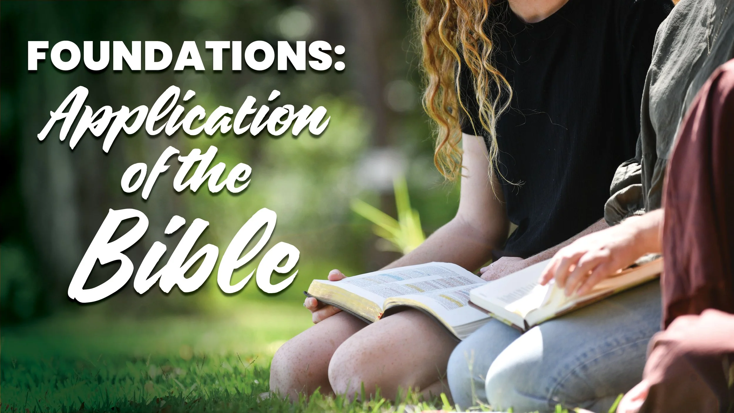 Three people gather with bibles on their laps, ready for a study in an outdoor setting.