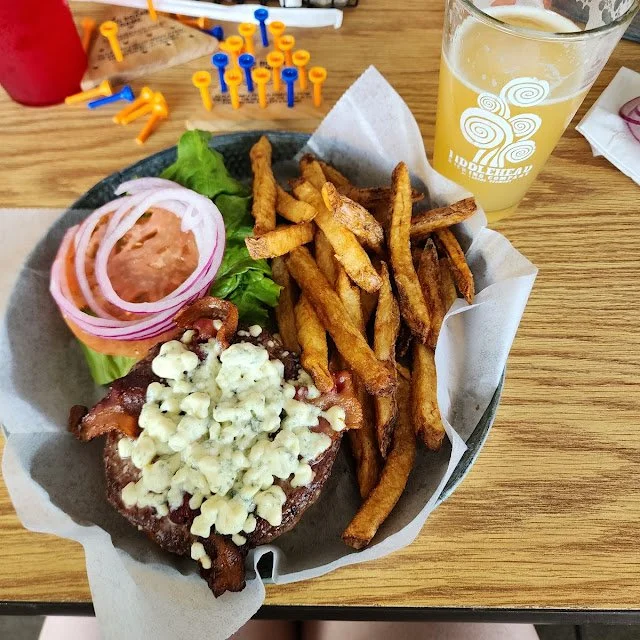 hamburger with bacon and blue cheese plus French fries.
