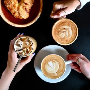 3 specialty coffee drinks and a cookie