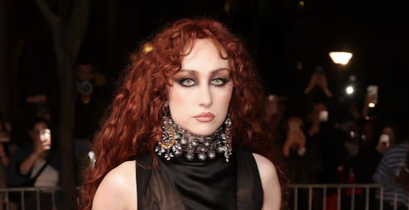 Chappell Roan Leaves little to the imagination in sheer dress at Paris fashion week