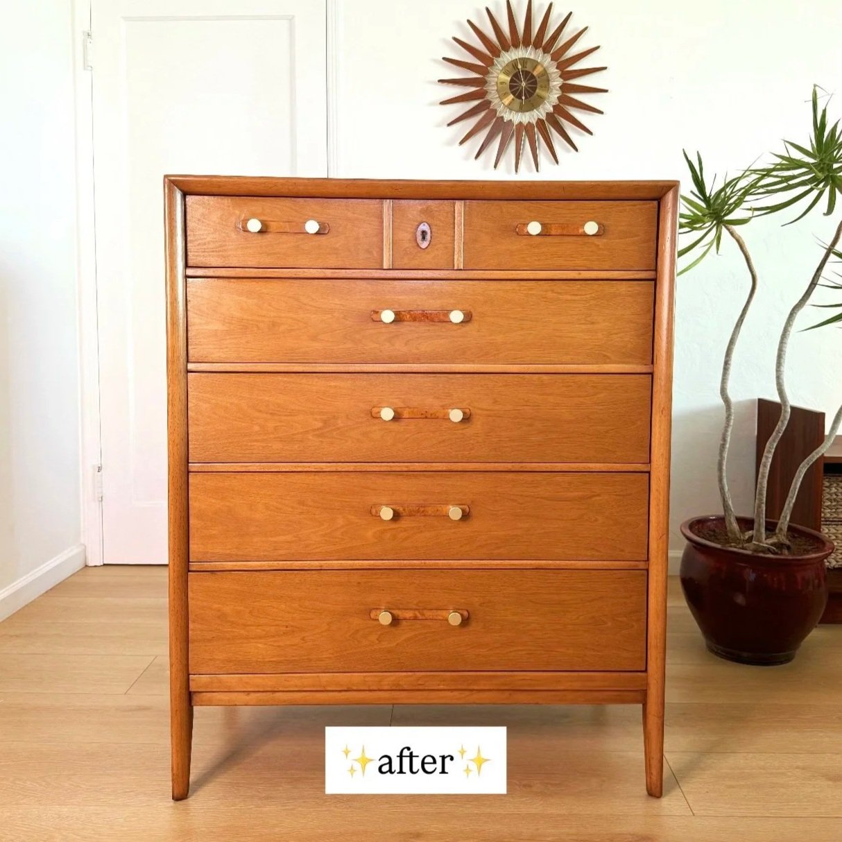 A wooden dresser with multiple drawers and light-colored knobs, situated in a room with light-colored walls, a potted plant, and a decorative wall clock above it, labeled 'after.'