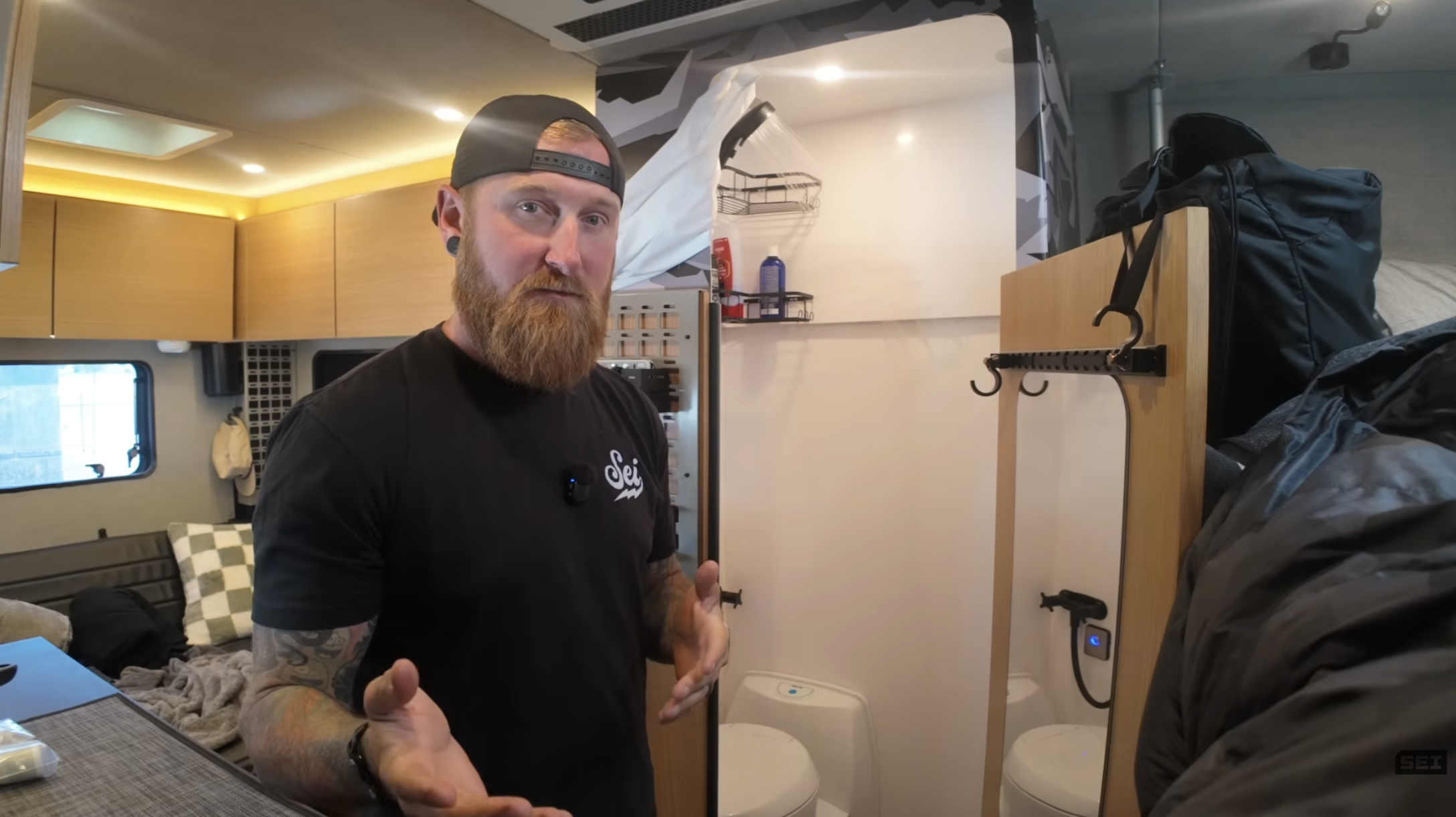 Talon Sei Reviews the Infinity Shower in His Rossmönster Baja Trail Truck Camper