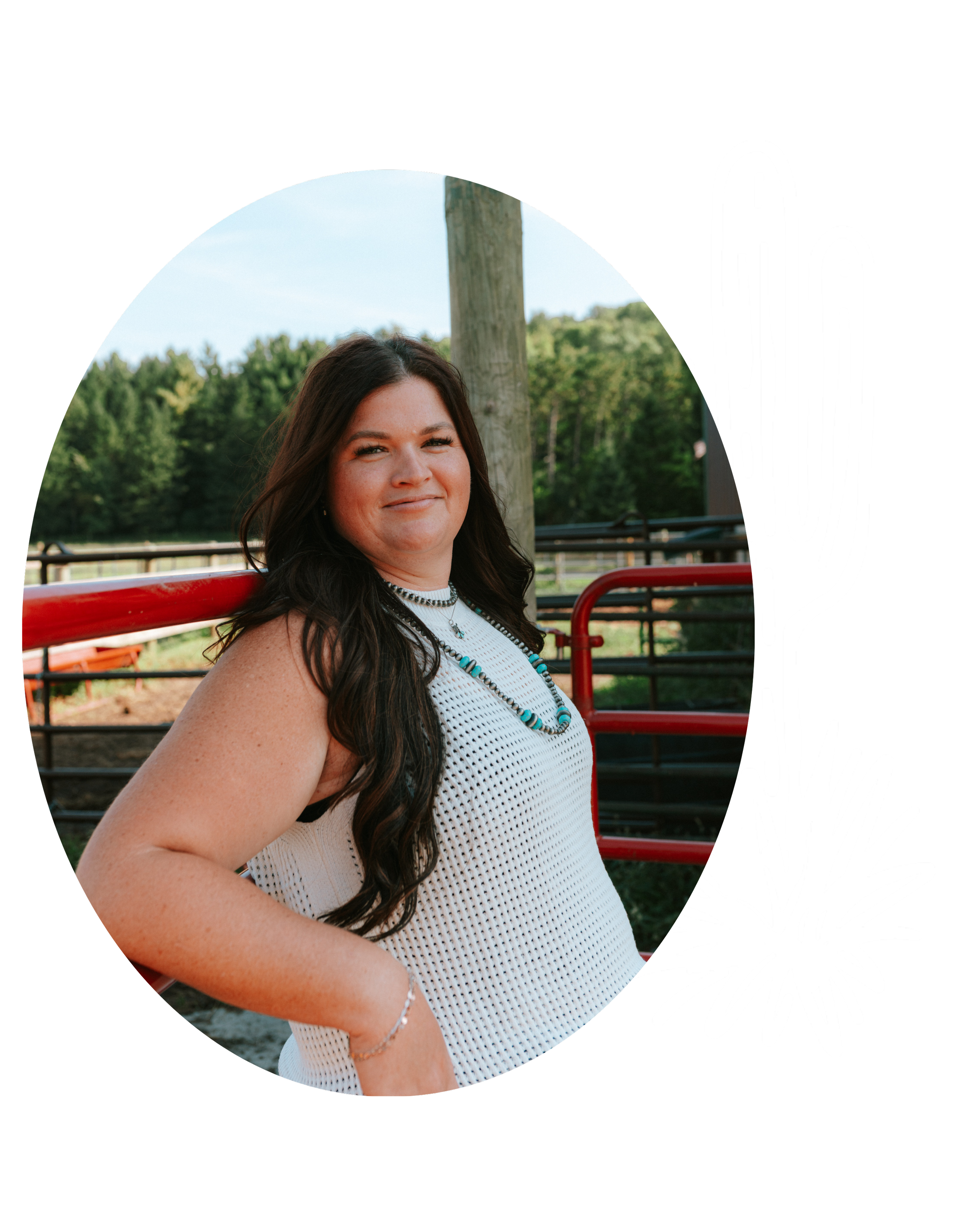 Ryann with long dark hair in a white crochet top standing outdoors near wooden fencing with trees in the background
