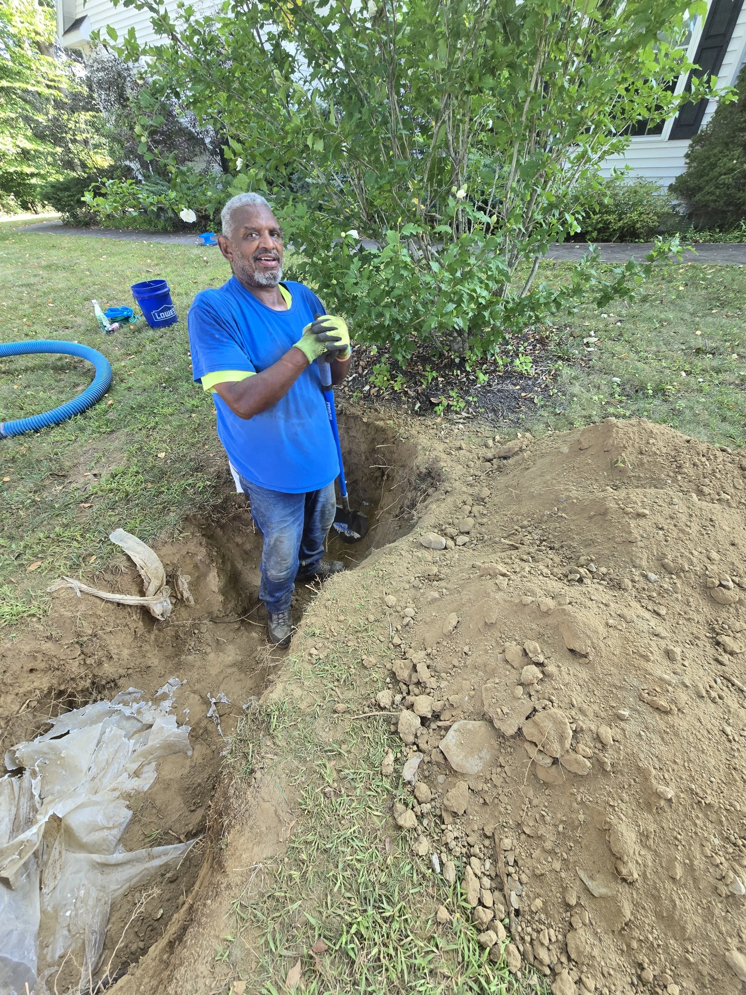 Digging up septic tank to put on a green riser