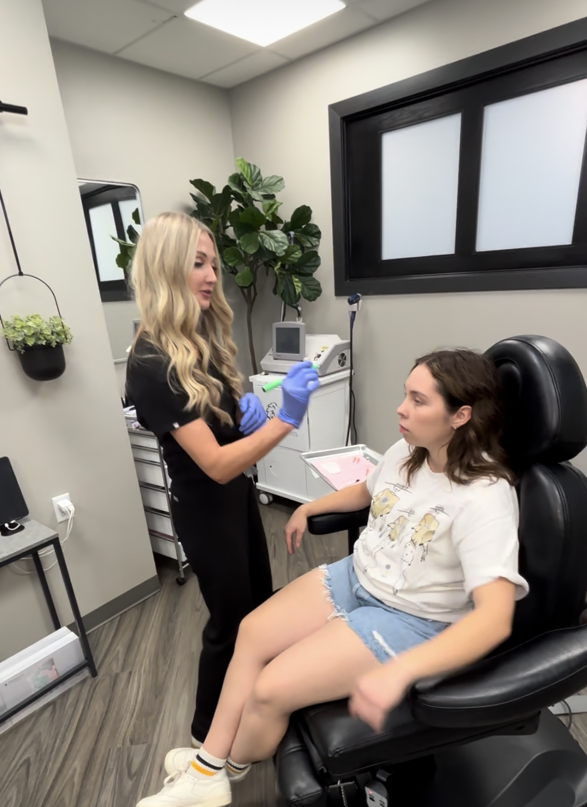 Two vials of Sculptra Poly-L-lactic acid with packaging in the background.